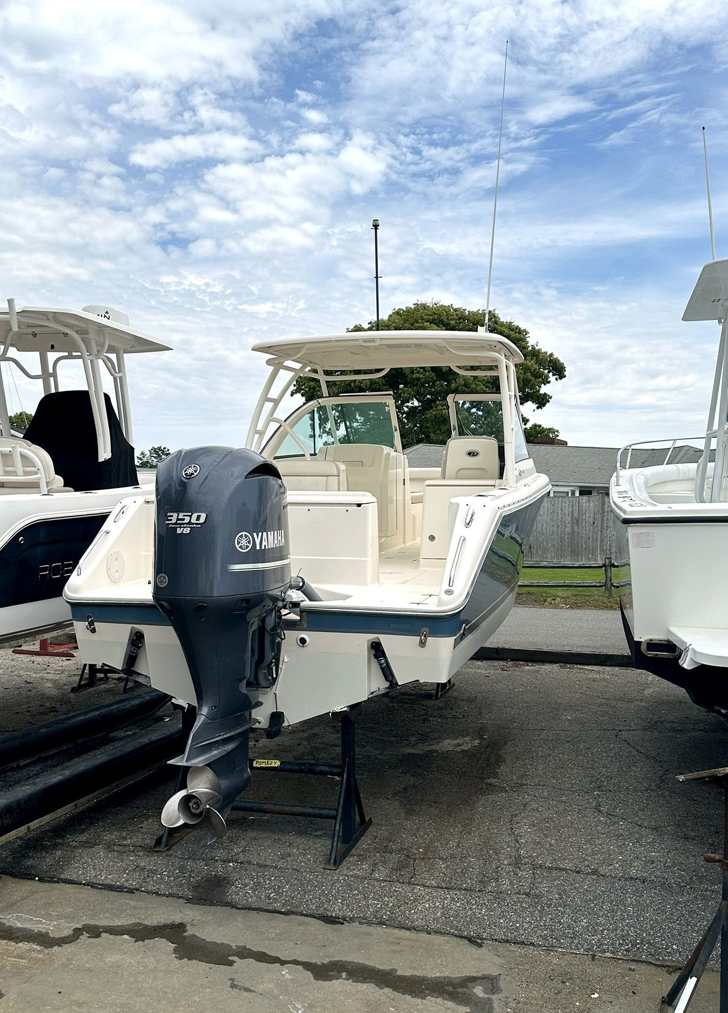 2012 Pursuit DC 265 Dual Console boat on a trailer.