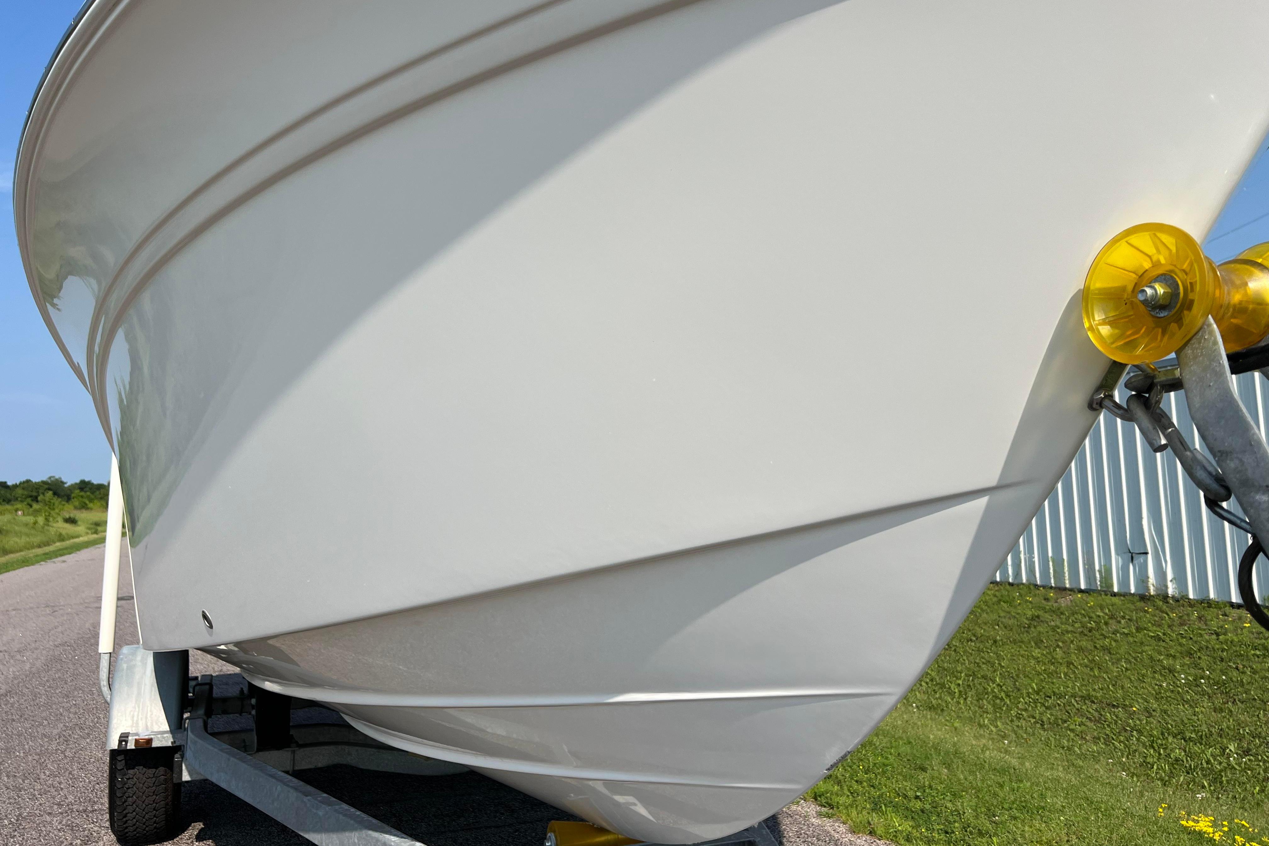 2012 Sea Fox 206 Center Console boat on trailer, close-up view of hull and bow.
