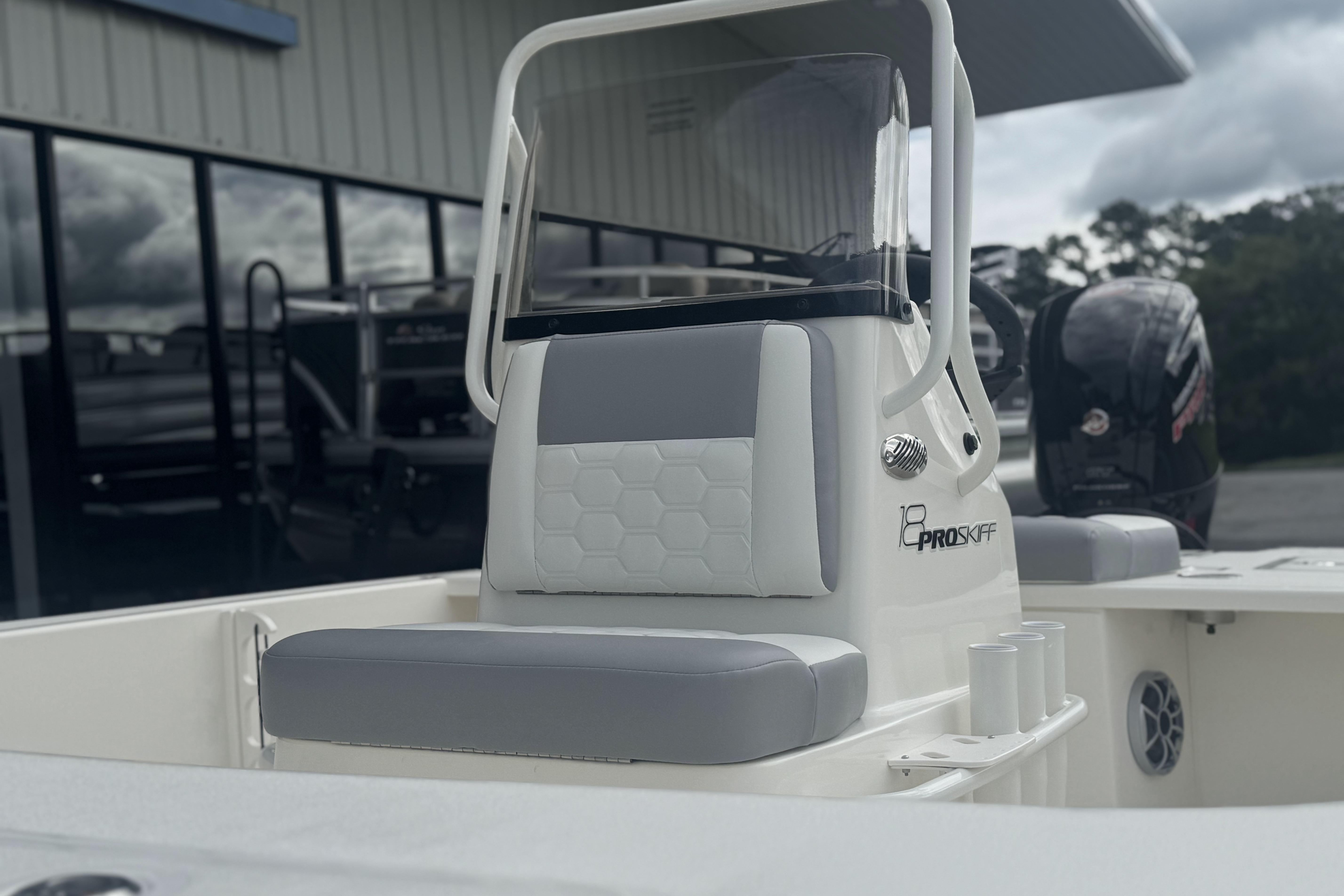 2026 Mako 18 Pro Skiff boat with sleek seating and modern design.