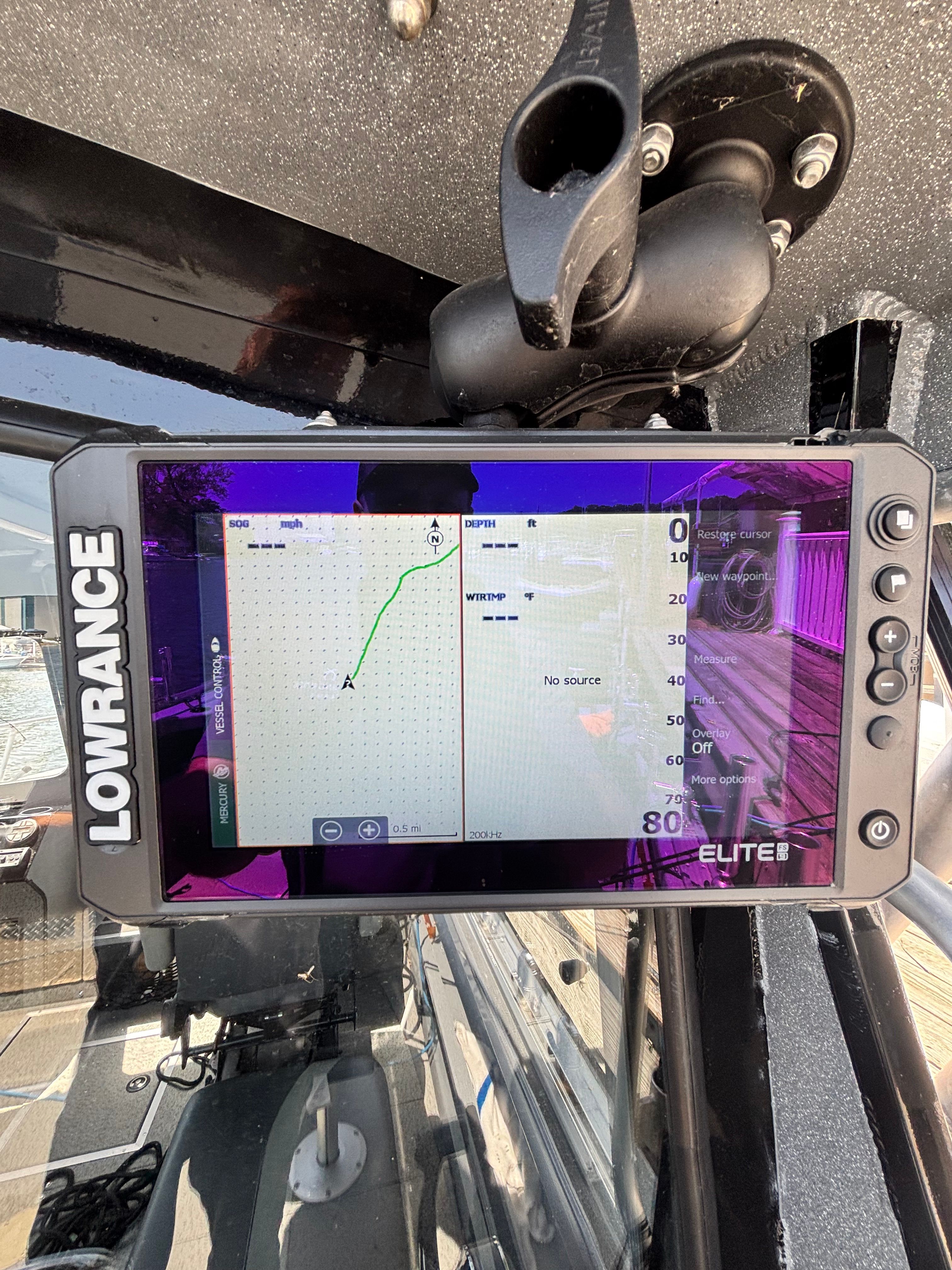 A Lowrance Elite fishfinder on a 2021 Spartan 240 Maximus boat.