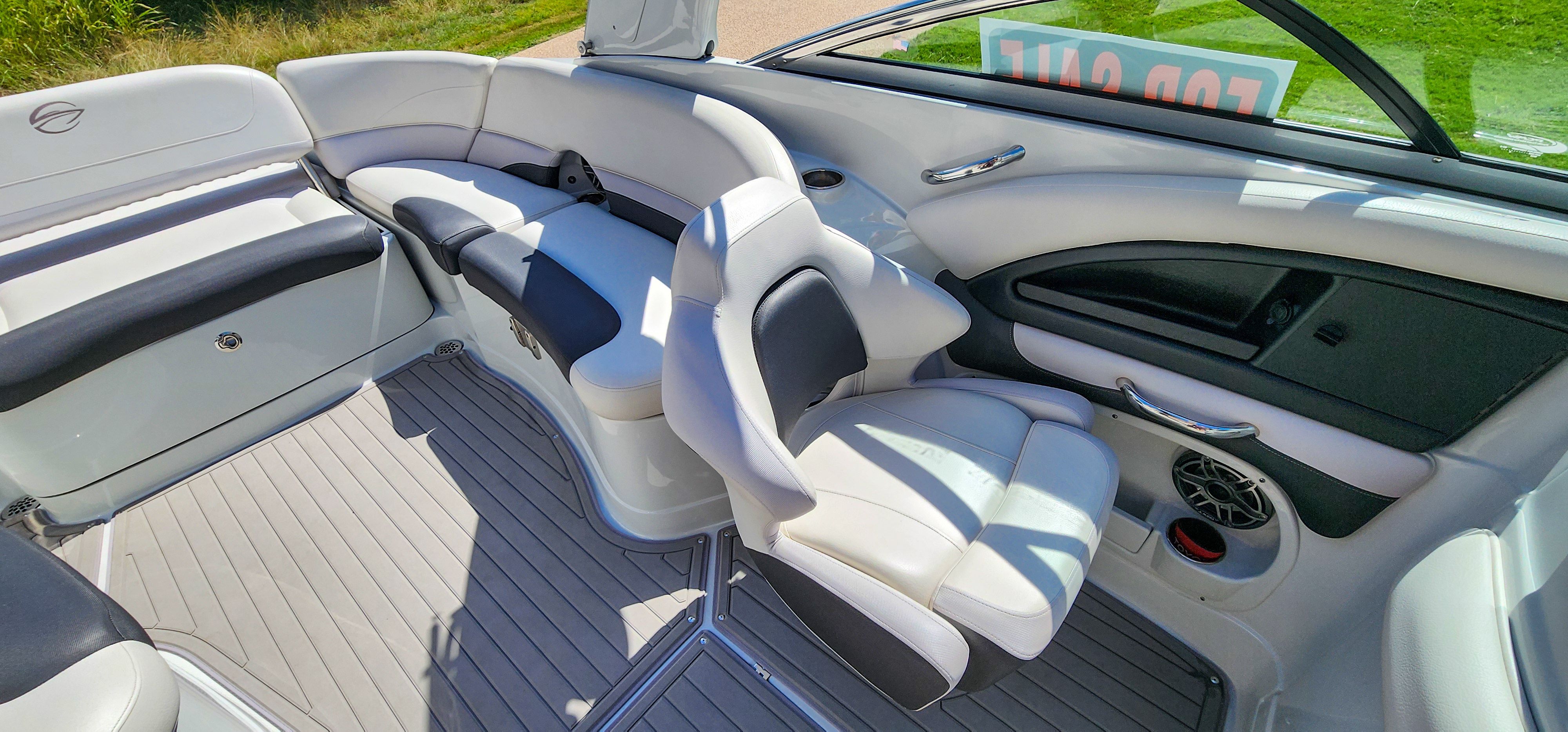 Interior of a 2017 Crownline 285SS boat with white and black seating.
