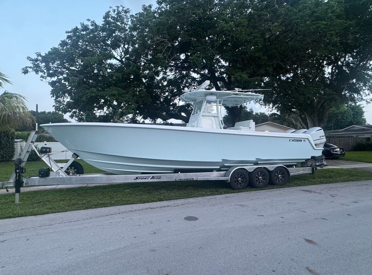 2019 Contender 35 ST boat on trailer, side view.