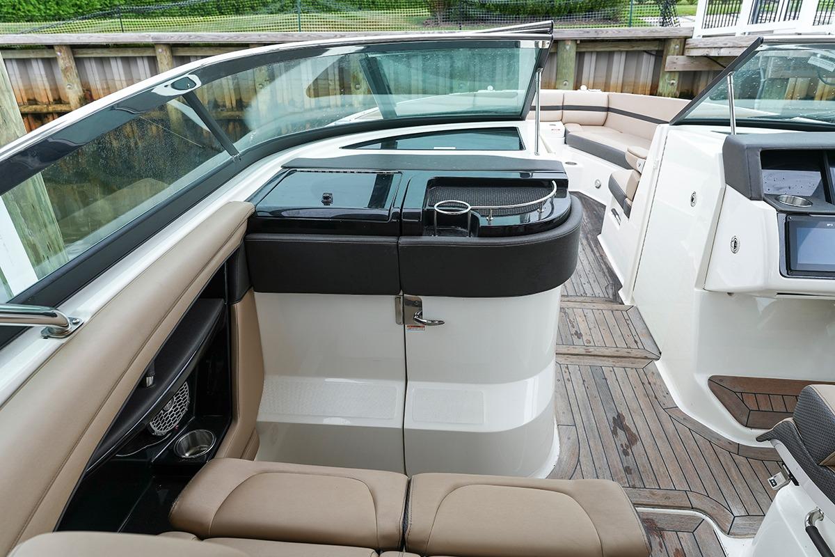 2018 Sea Ray SLX 350 boat interior with sleek seating and modern dashboard design.