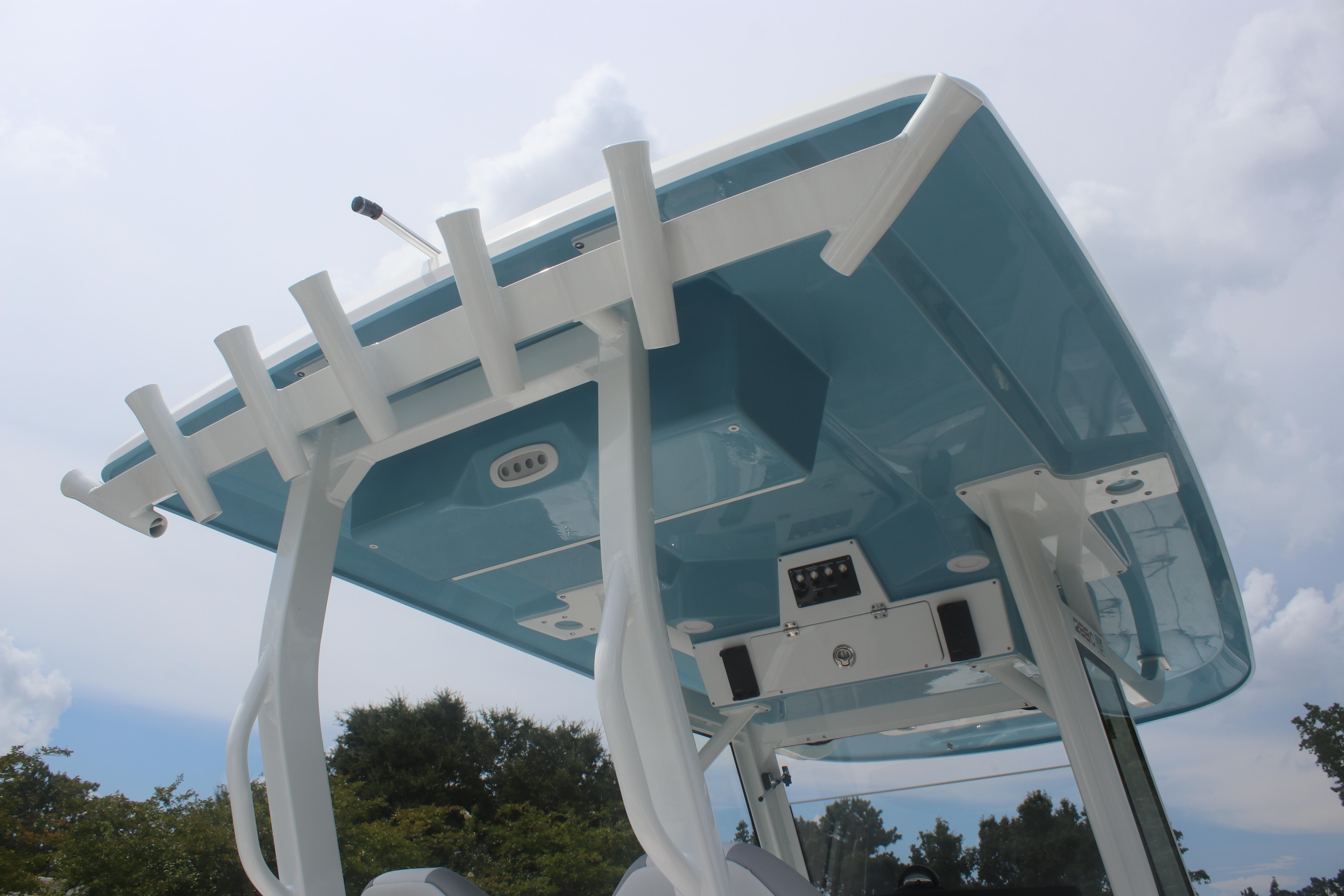 2026 Sea Fox 288 Commander boat, featuring a sleek blue and white T-top design.