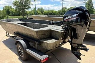 2025 Tracker Grizzly 1650 T Prairie Wings Edition boat with Mercury engine on trailer.