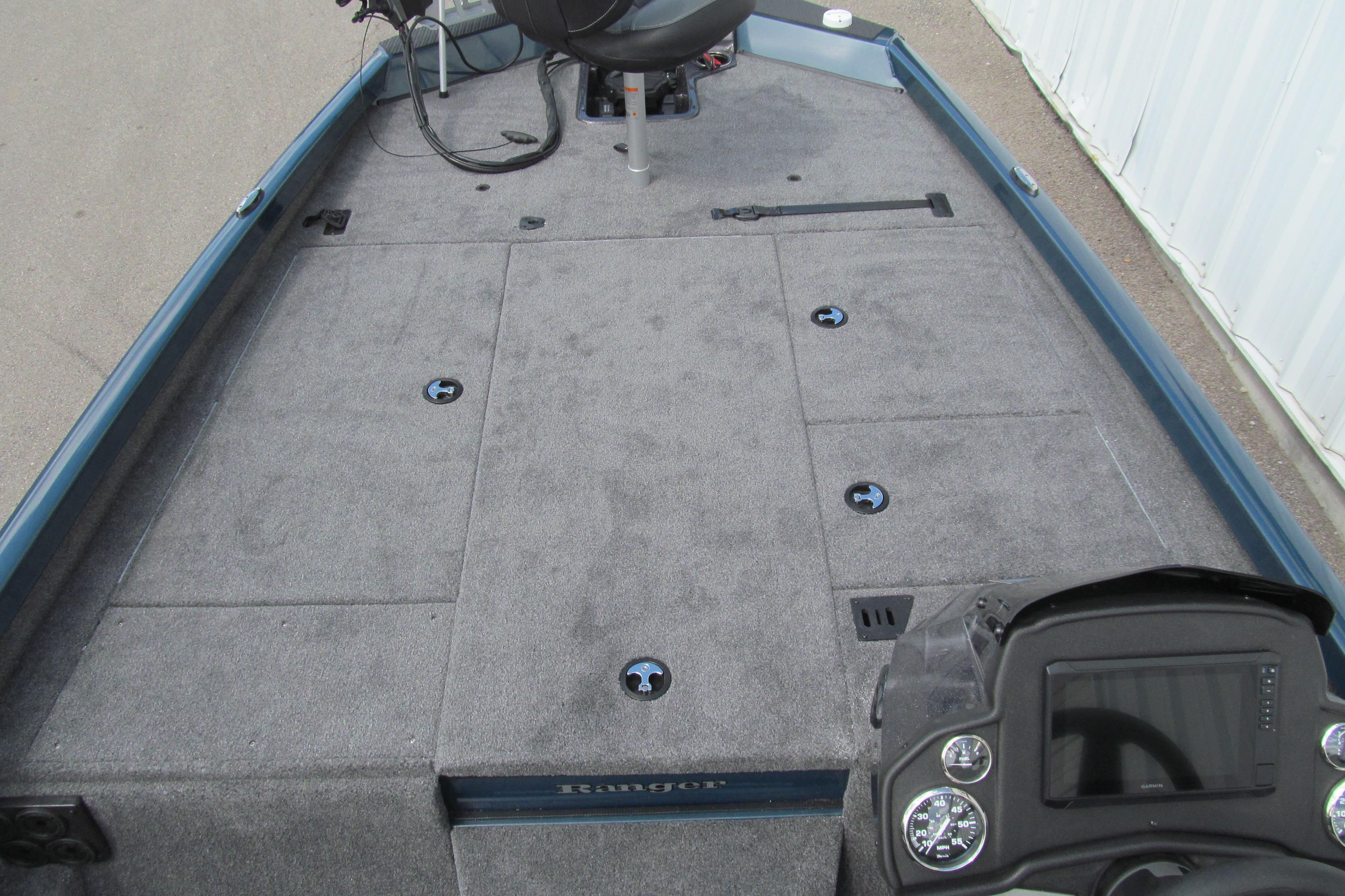 2026 Ranger RT198P boat interior with gray carpeted deck and control panel.