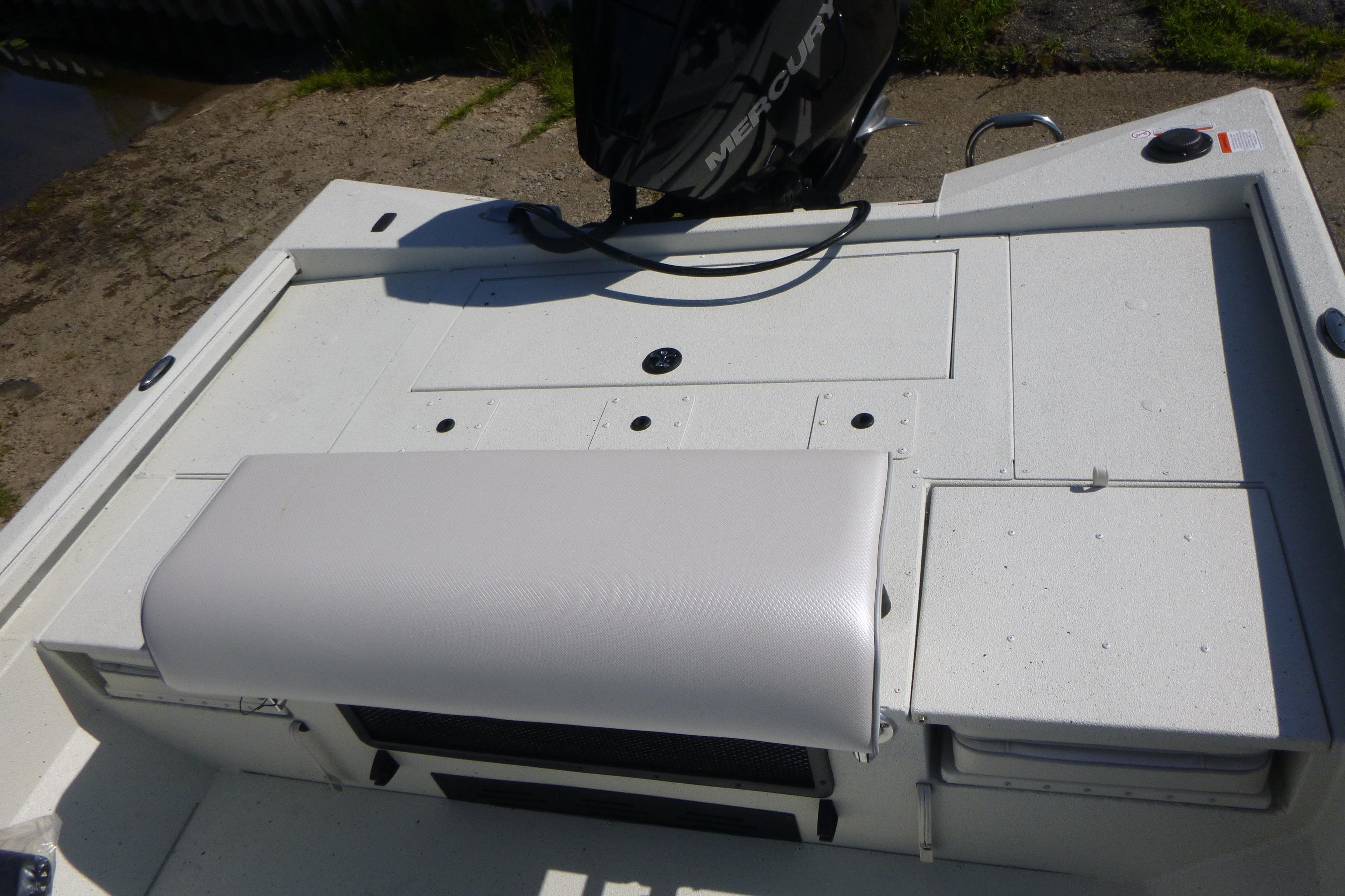 2025 Ranger RB210 boat deck with Mercury engine, featuring a white cushioned seat.
