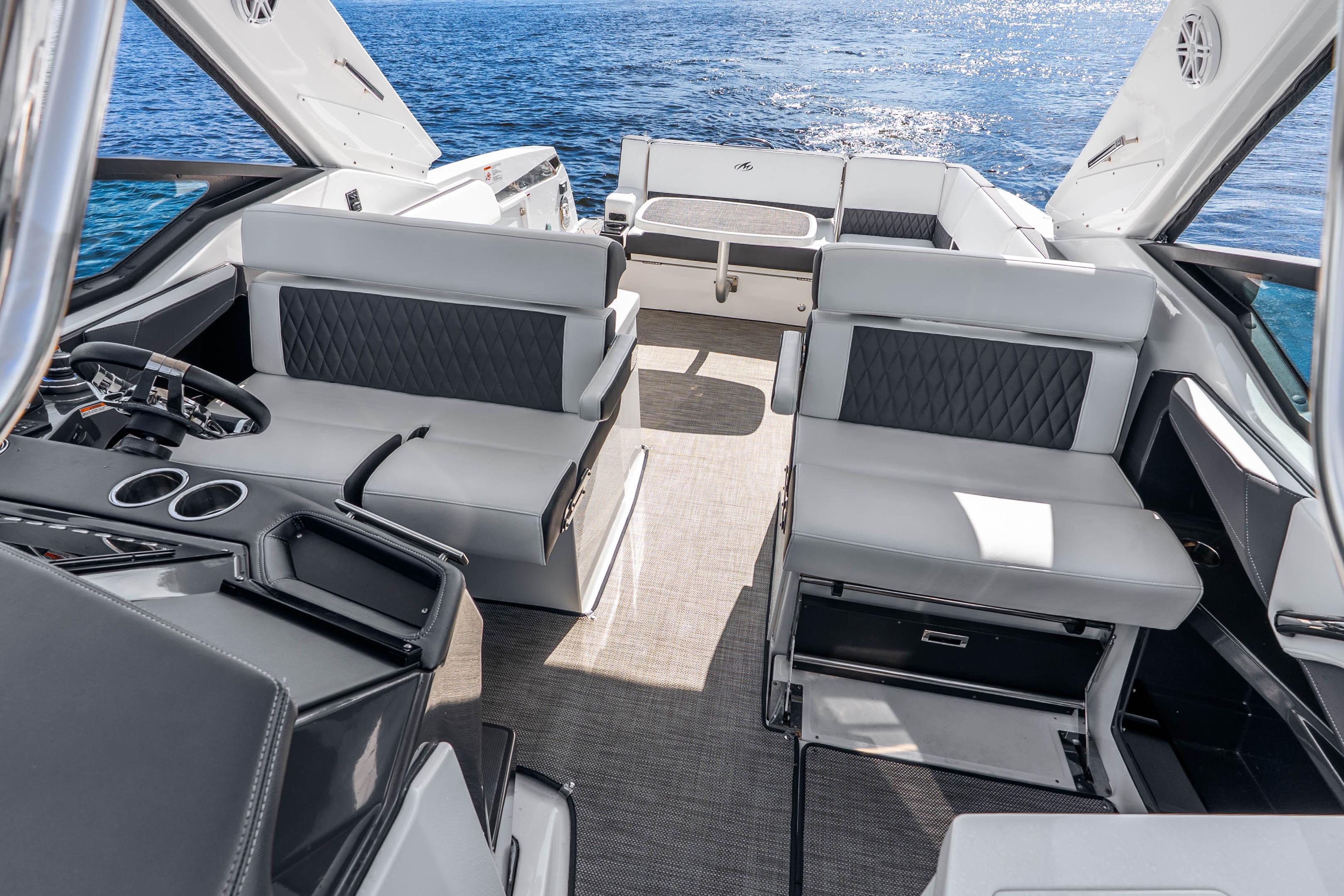 Luxurious interior of 2022 Monterey 378SS Super Sport boat with elegant seating and ocean view.