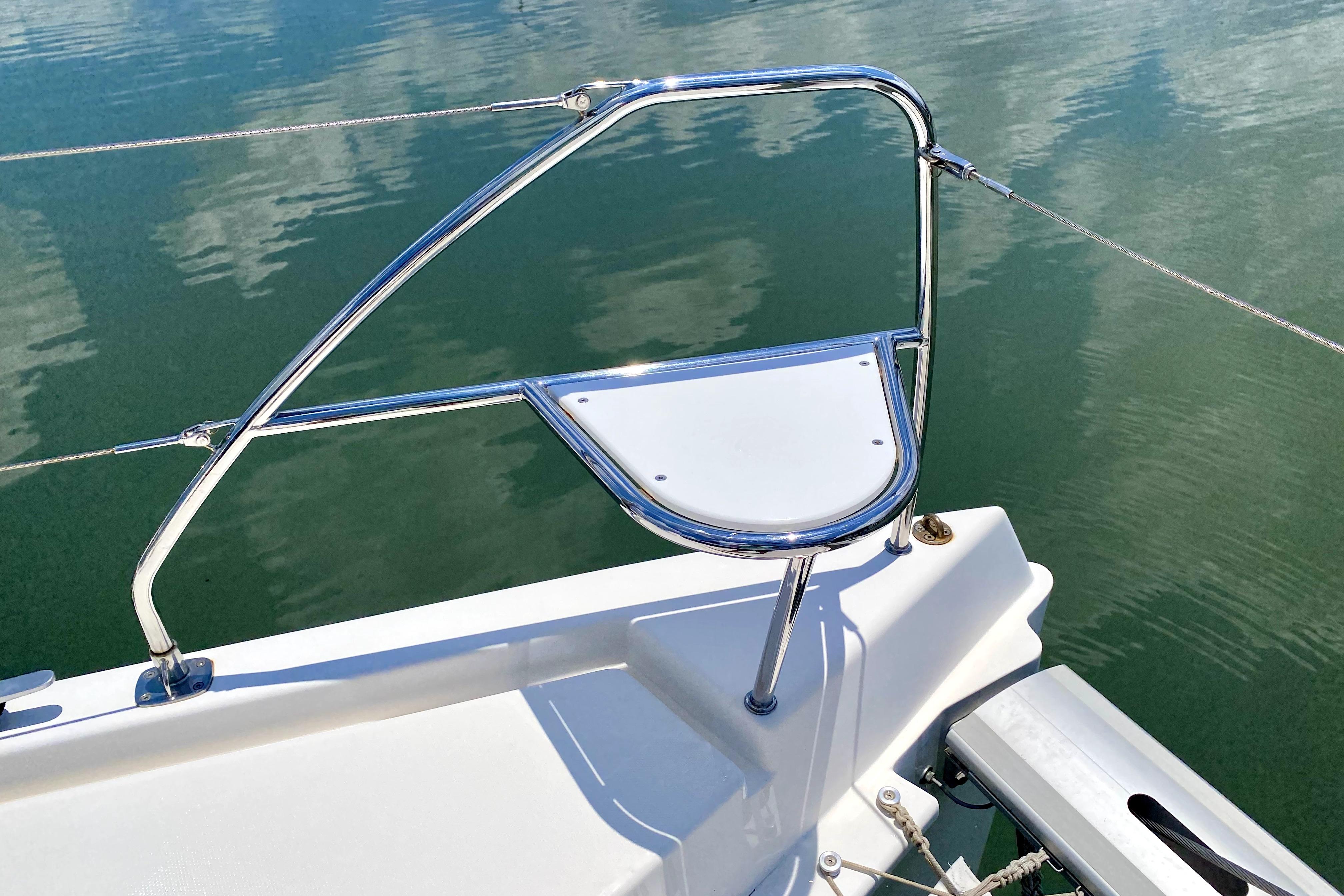 Stainless steel bow pulpit on 2017 Leopard 40 catamaran, reflecting on calm water.