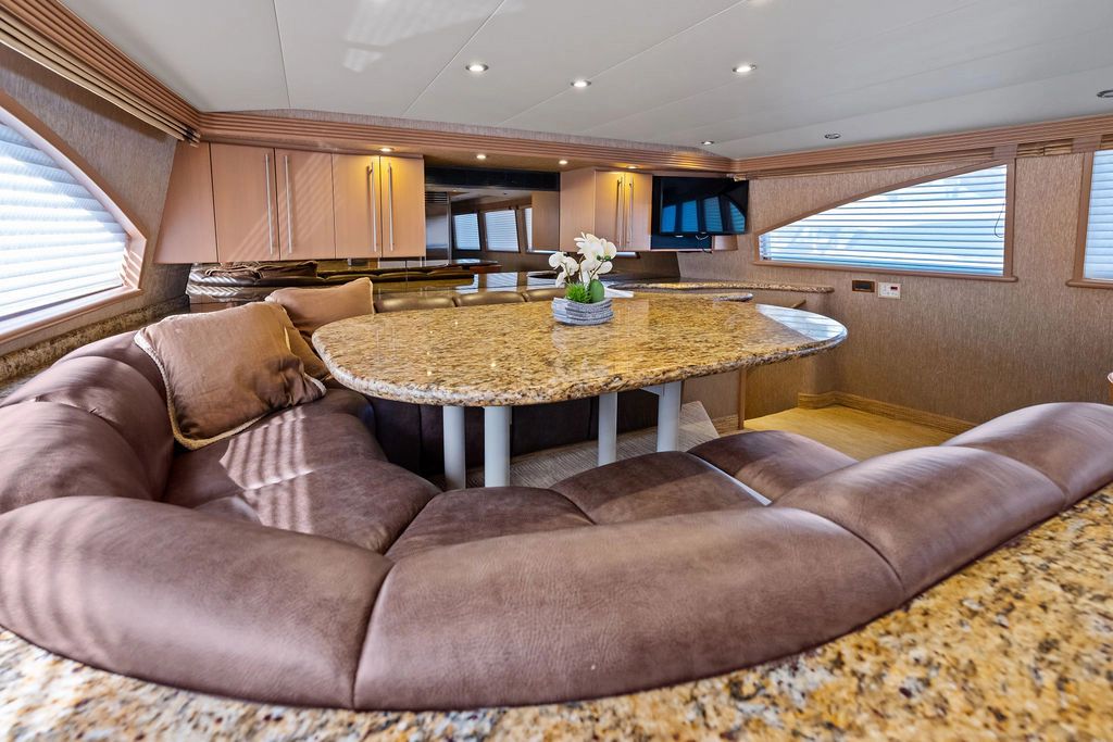 Luxurious interior of a 1999 Westport 112 yacht with elegant seating area.