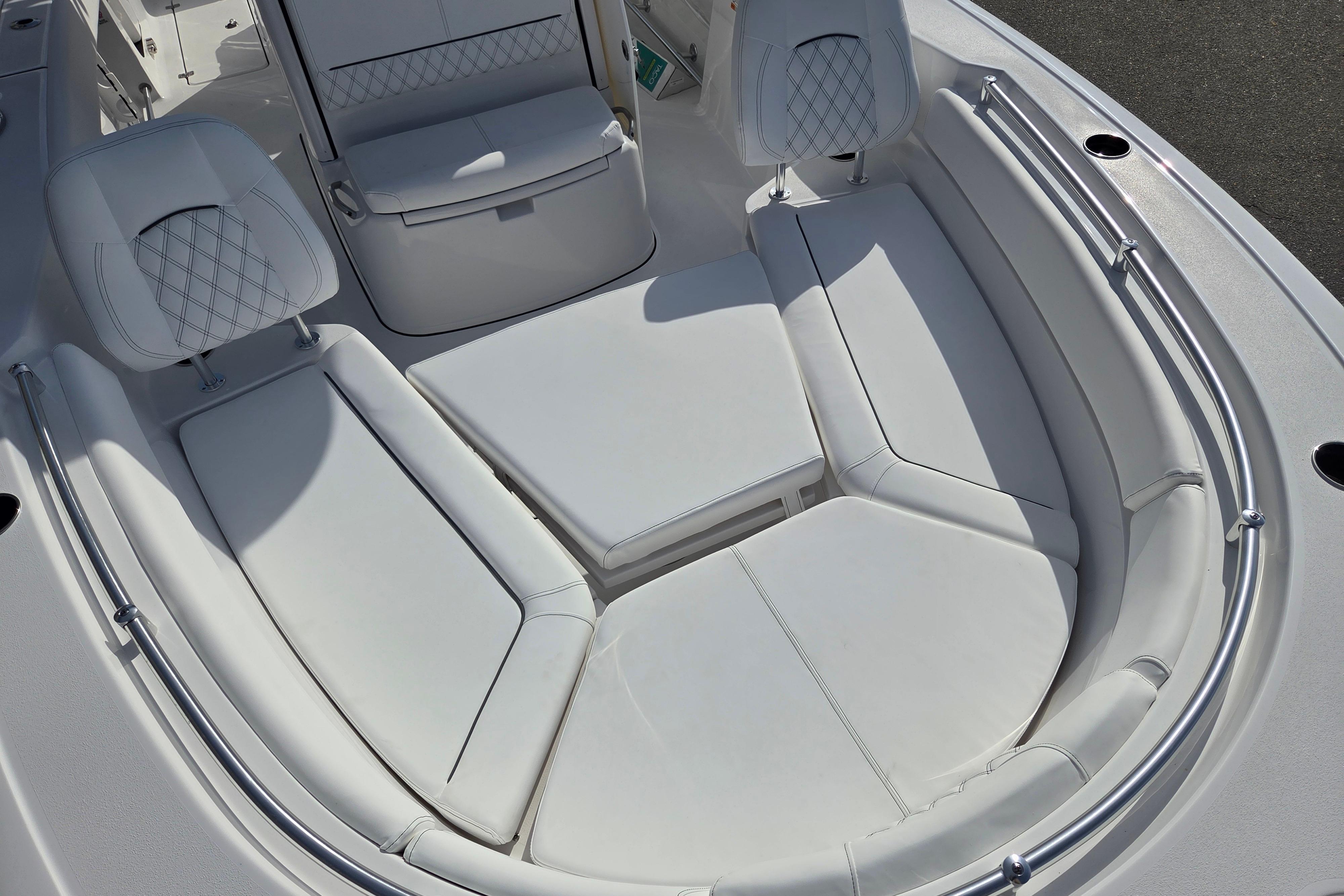 Luxurious seating area on 2026 Sportsman Heritage 261 Center Console boat.