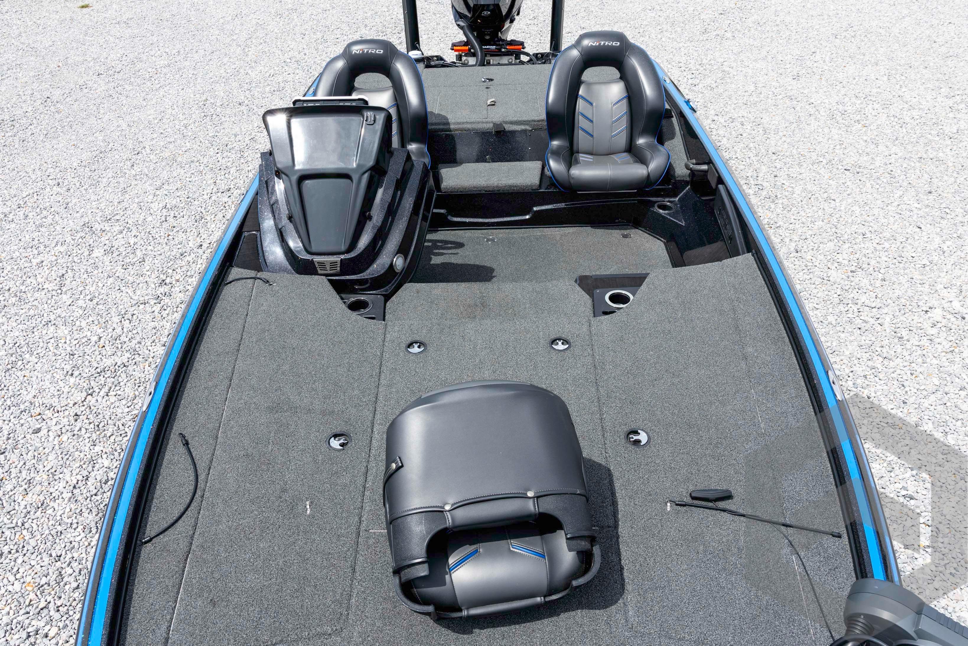 2023 Nitro Z18 boat interior with seating and carpeted deck.