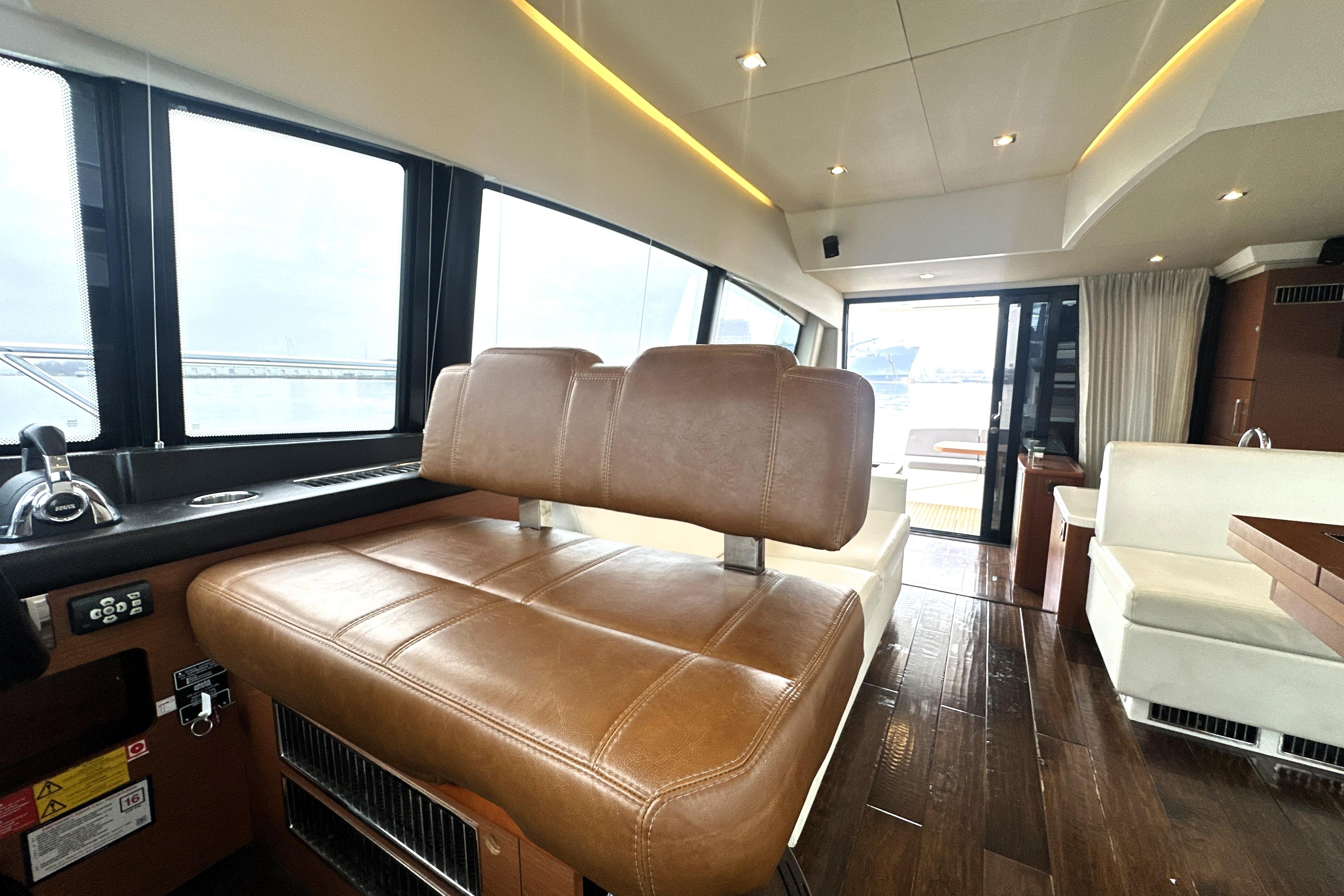 Interior of 2017 Prestige 500 yacht with leather seating and modern design.