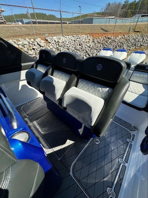 2019 Mystic Powerboats M4200 interior with luxurious seating and modern design.