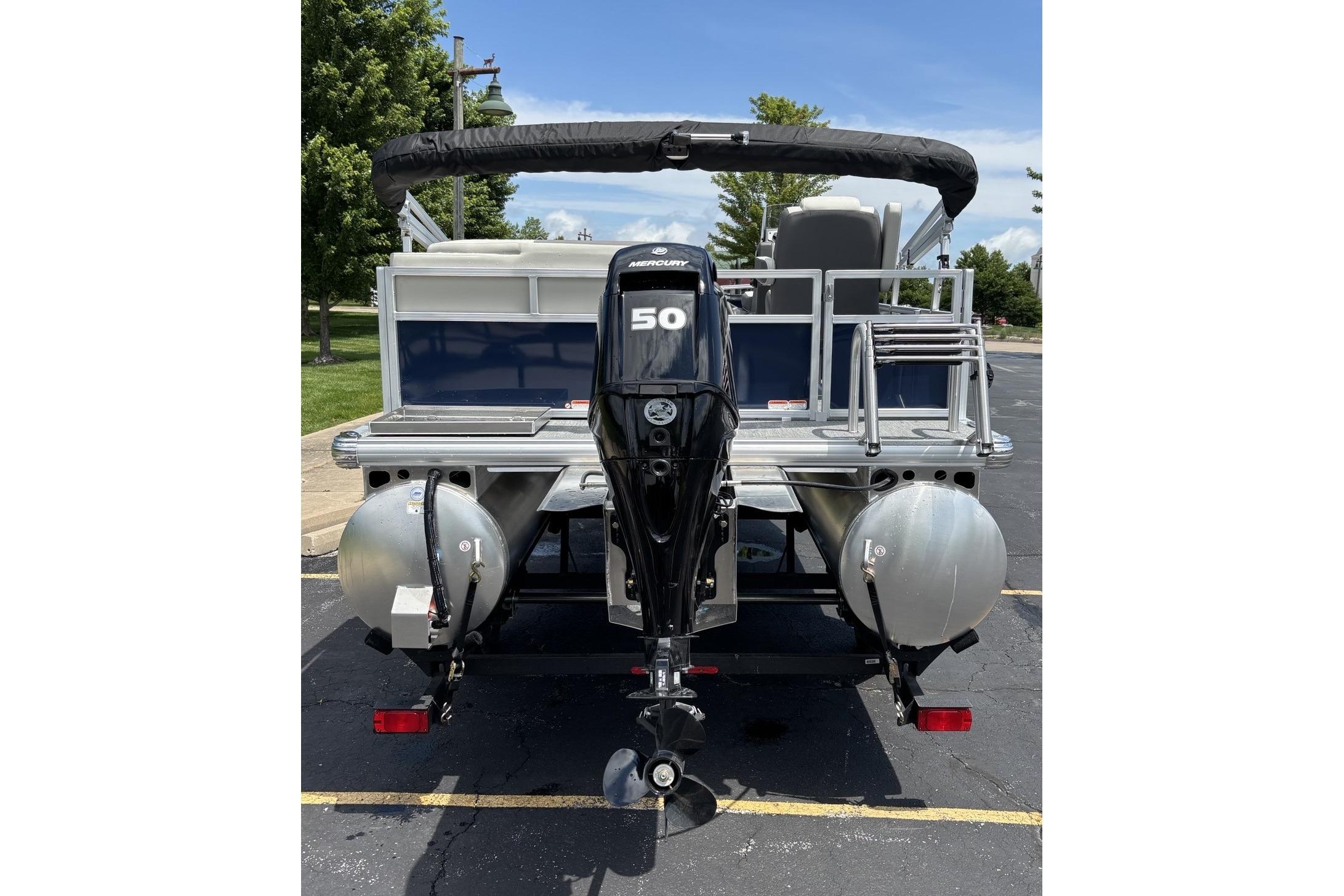 2026 Sun Tracker Bass Buggy 16 XL Select pontoon boat with Mercury 50 HP engine.