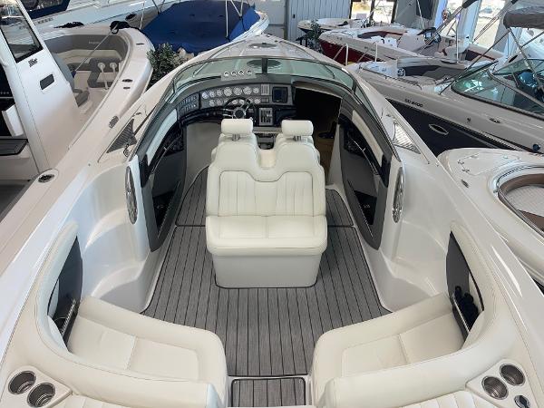 2005 Cobalt 343 boat interior with white seating and modern dashboard.