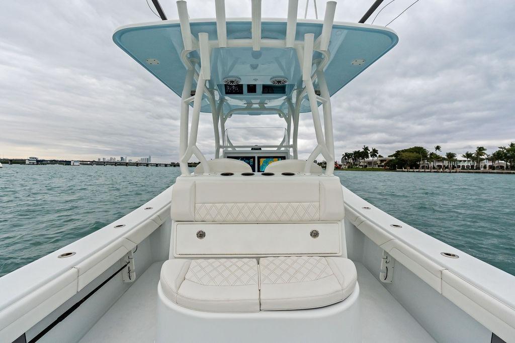 2021 Yellowfin 36 Offshore boat on water, featuring sleek design and spacious seating.