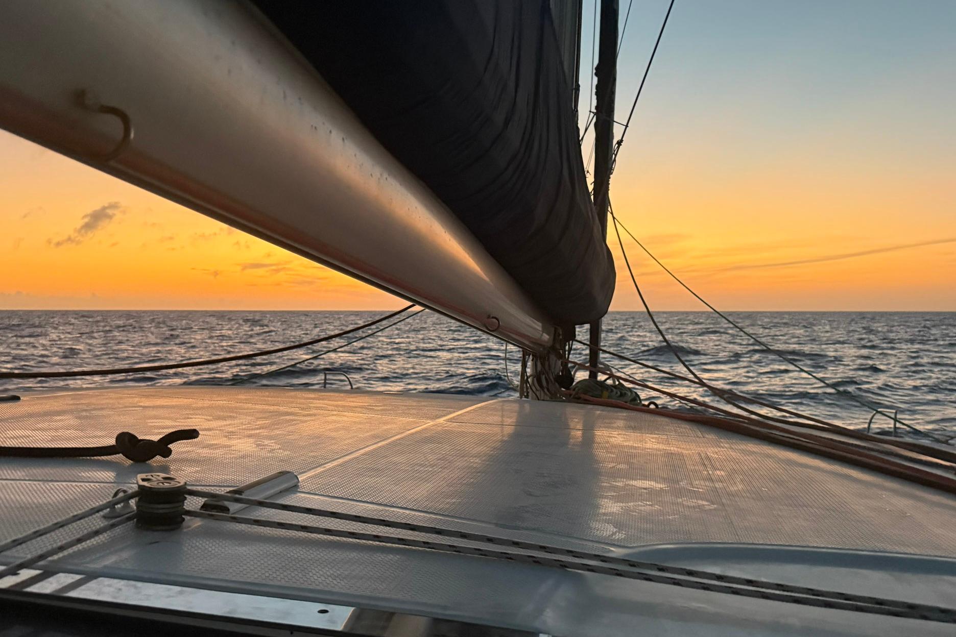Sailing at sunset on a 2008 Fountaine Pajot Salina 48 catamaran.