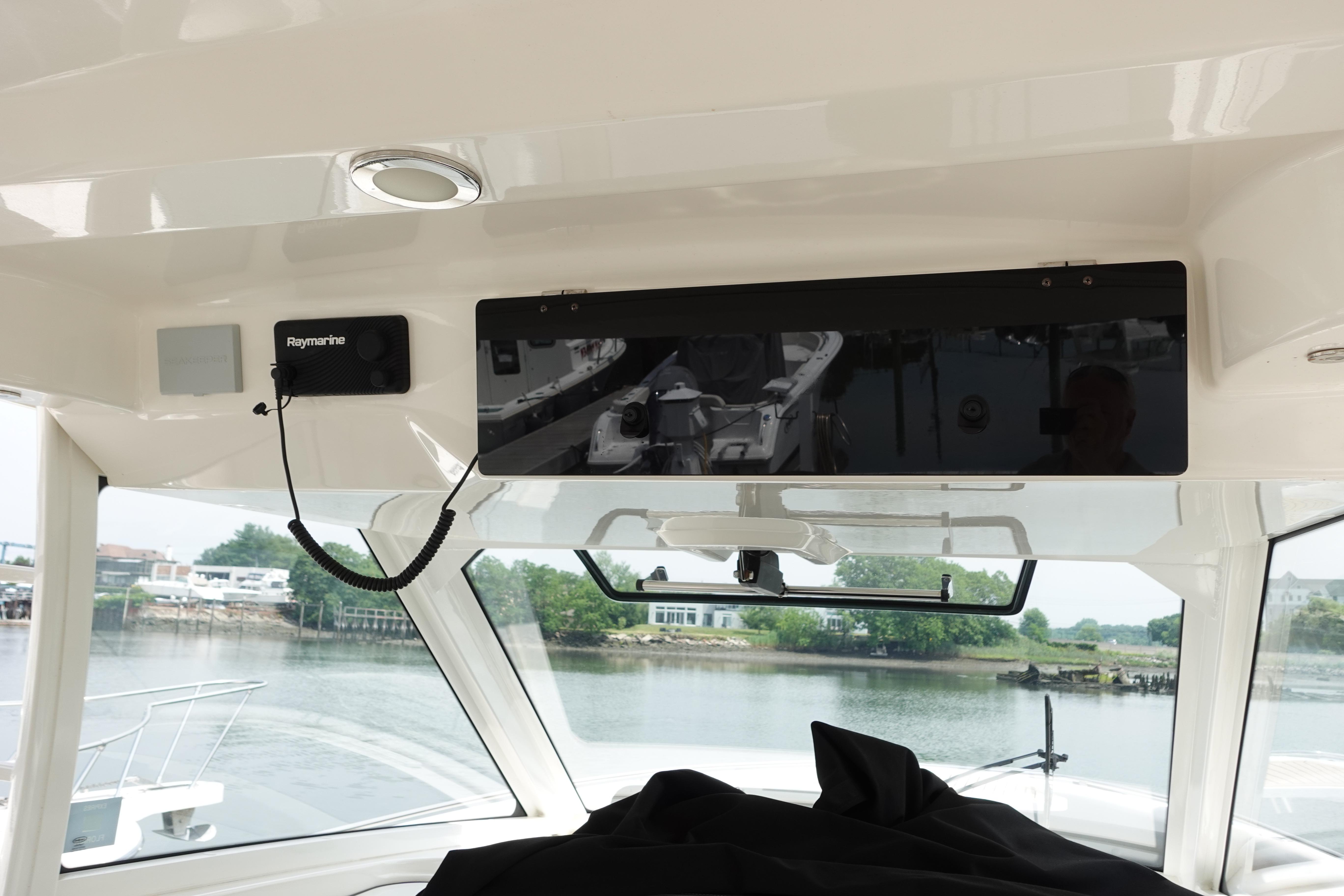 Interior view of 2020 Boston Whaler 420 Outrage boat with Raymarine electronics.