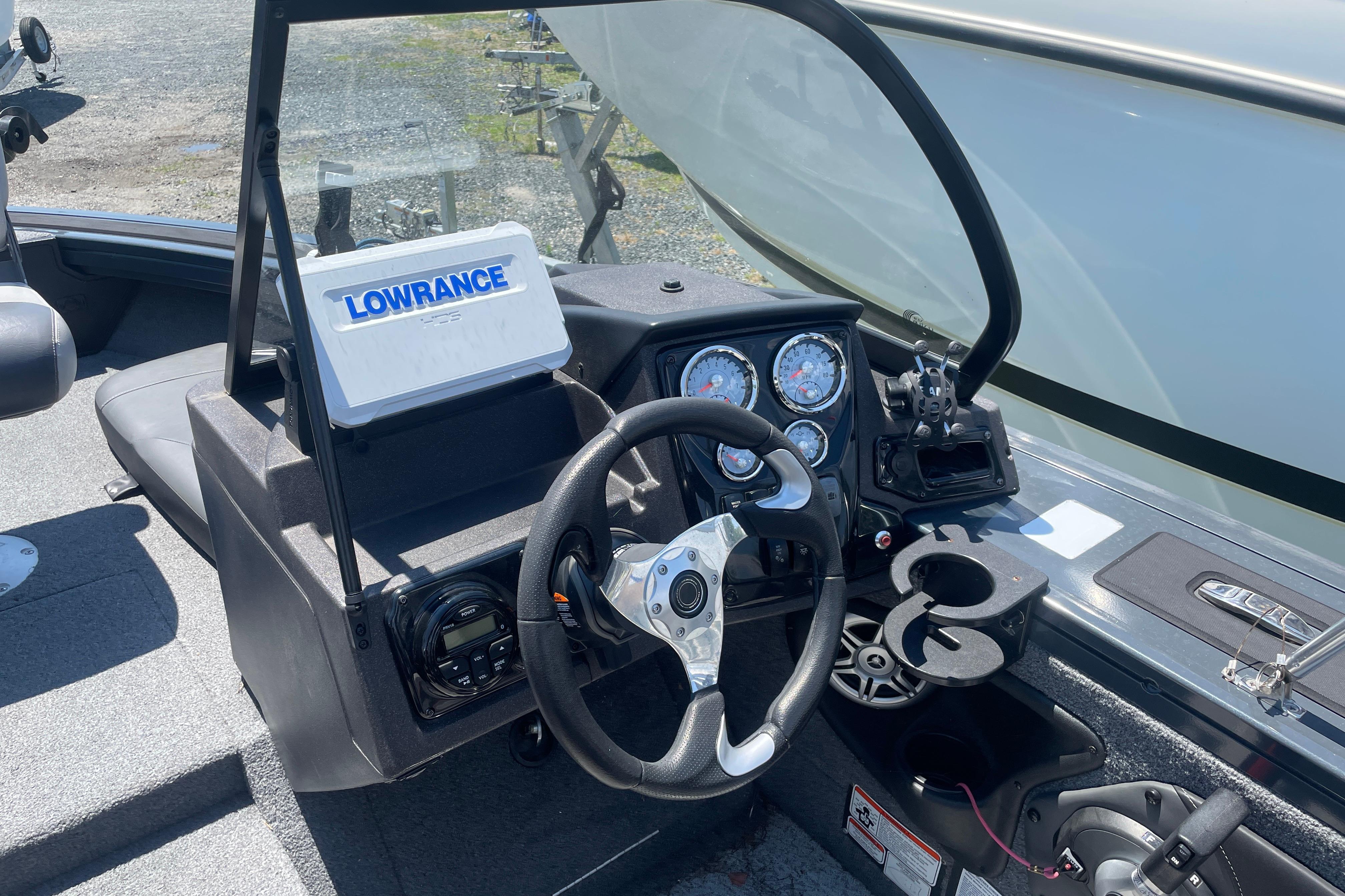 2022 Tracker Targa V-18 WT boat dashboard with Lowrance electronics and steering wheel.