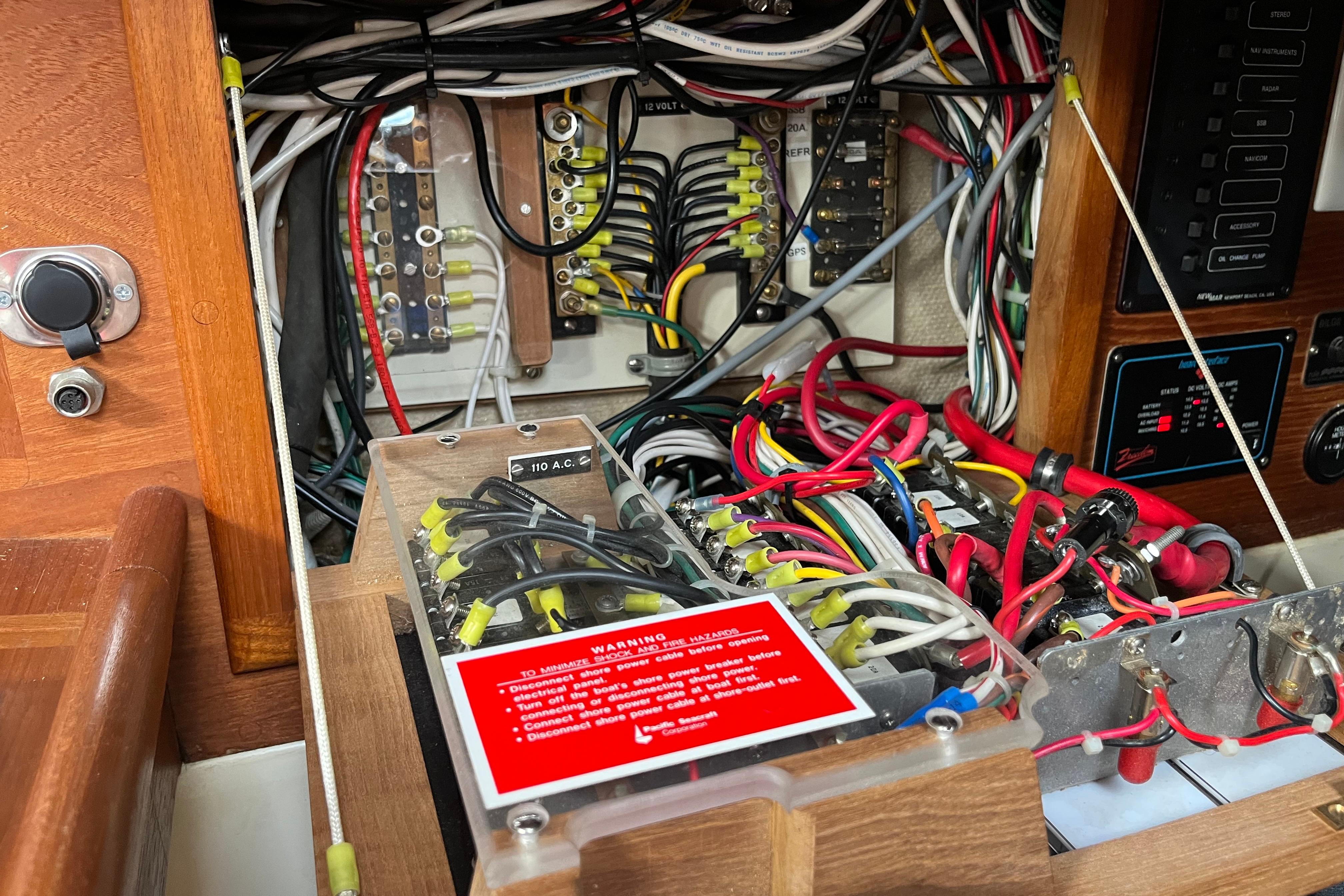 Electrical wiring and panel inside a 1997 Pacific Seacraft Crealock 34 sailboat.