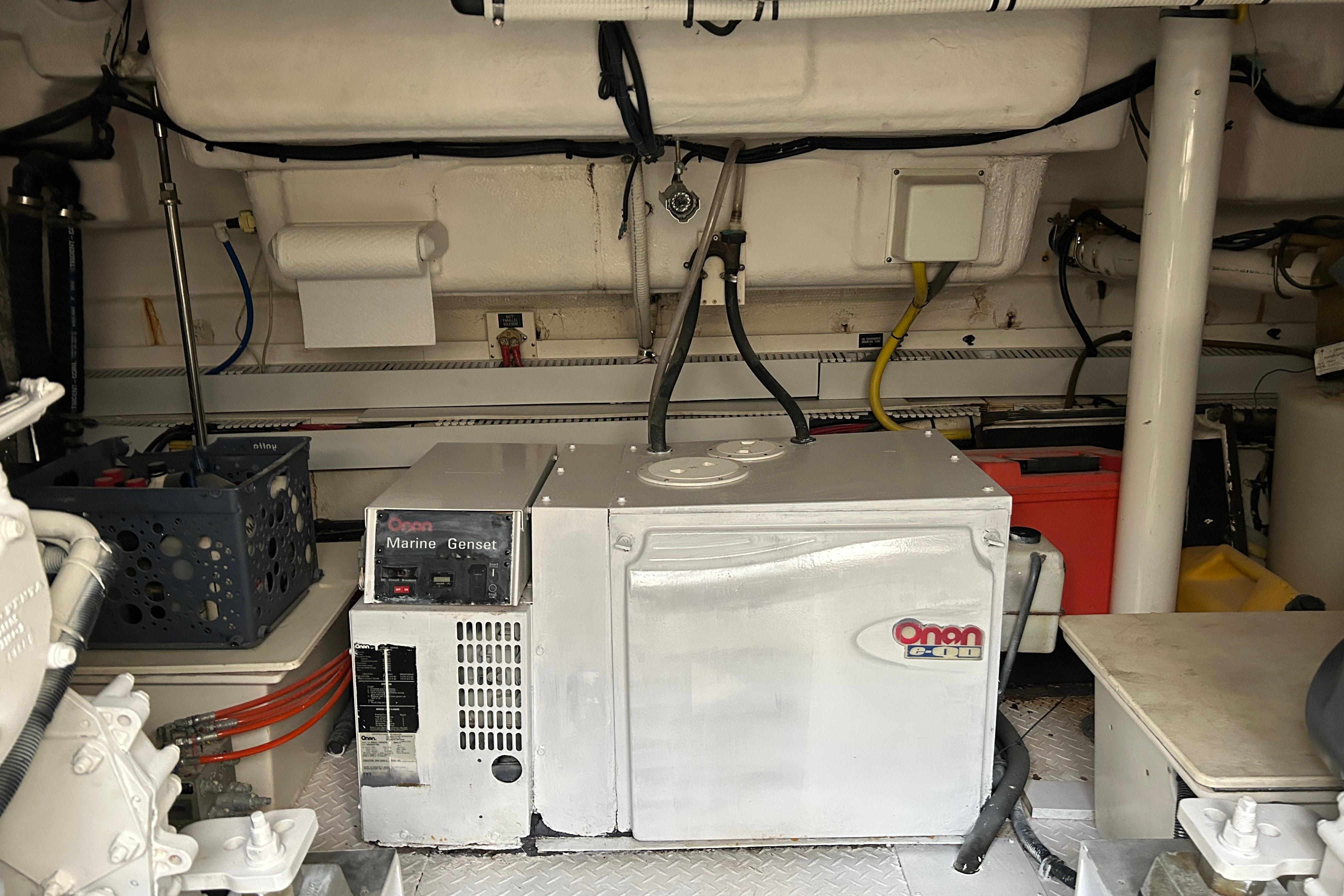 Engine room of 2003 Cruisers Yachts 540 Express with Onan marine generator.