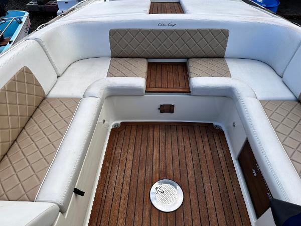 2014 Chris-Craft 28 LAUNCH boat with luxurious seating and teak flooring.