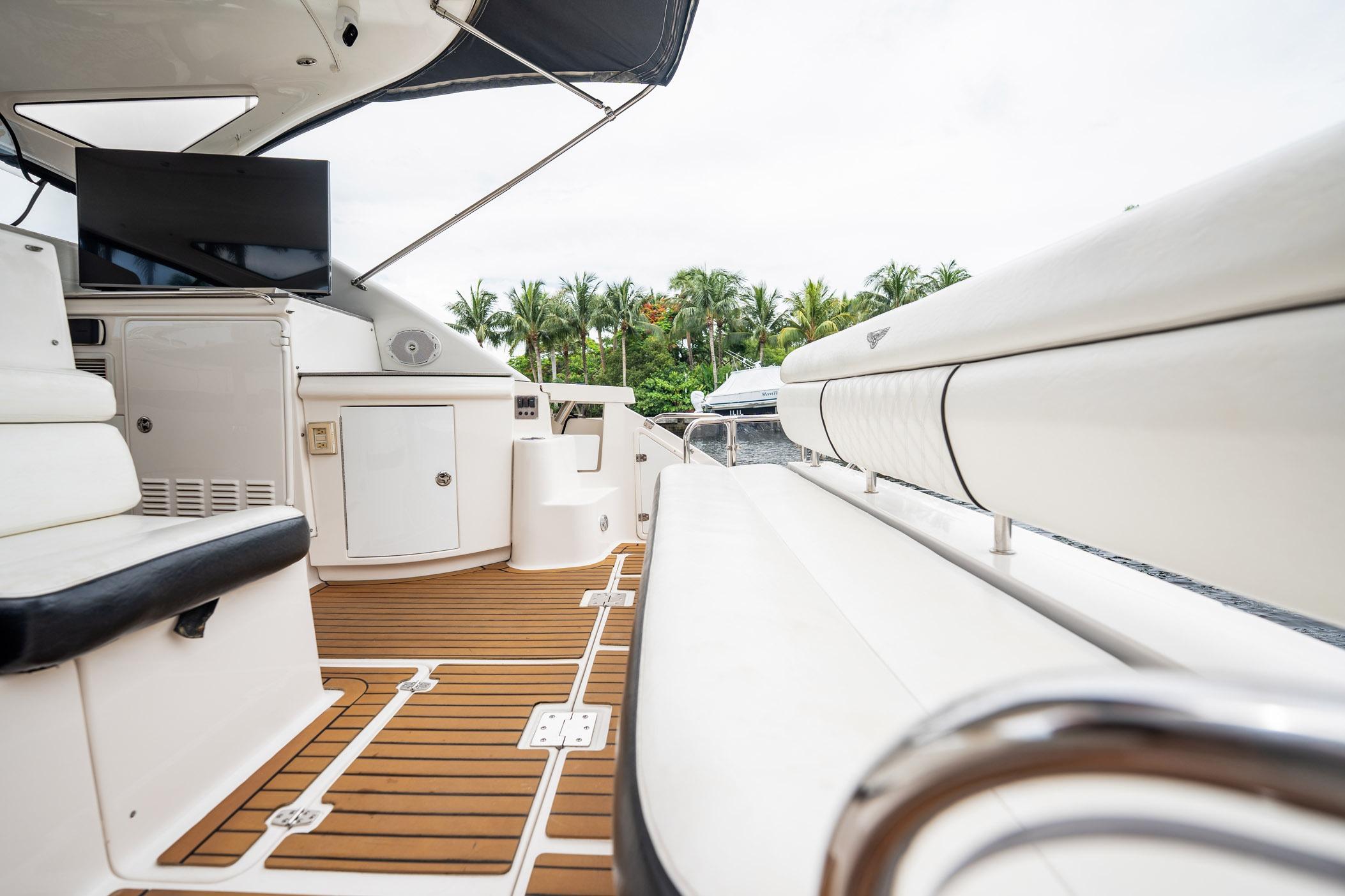 Luxurious 2008 Regal Commodore 4460 yacht interior with sleek seating and modern amenities.