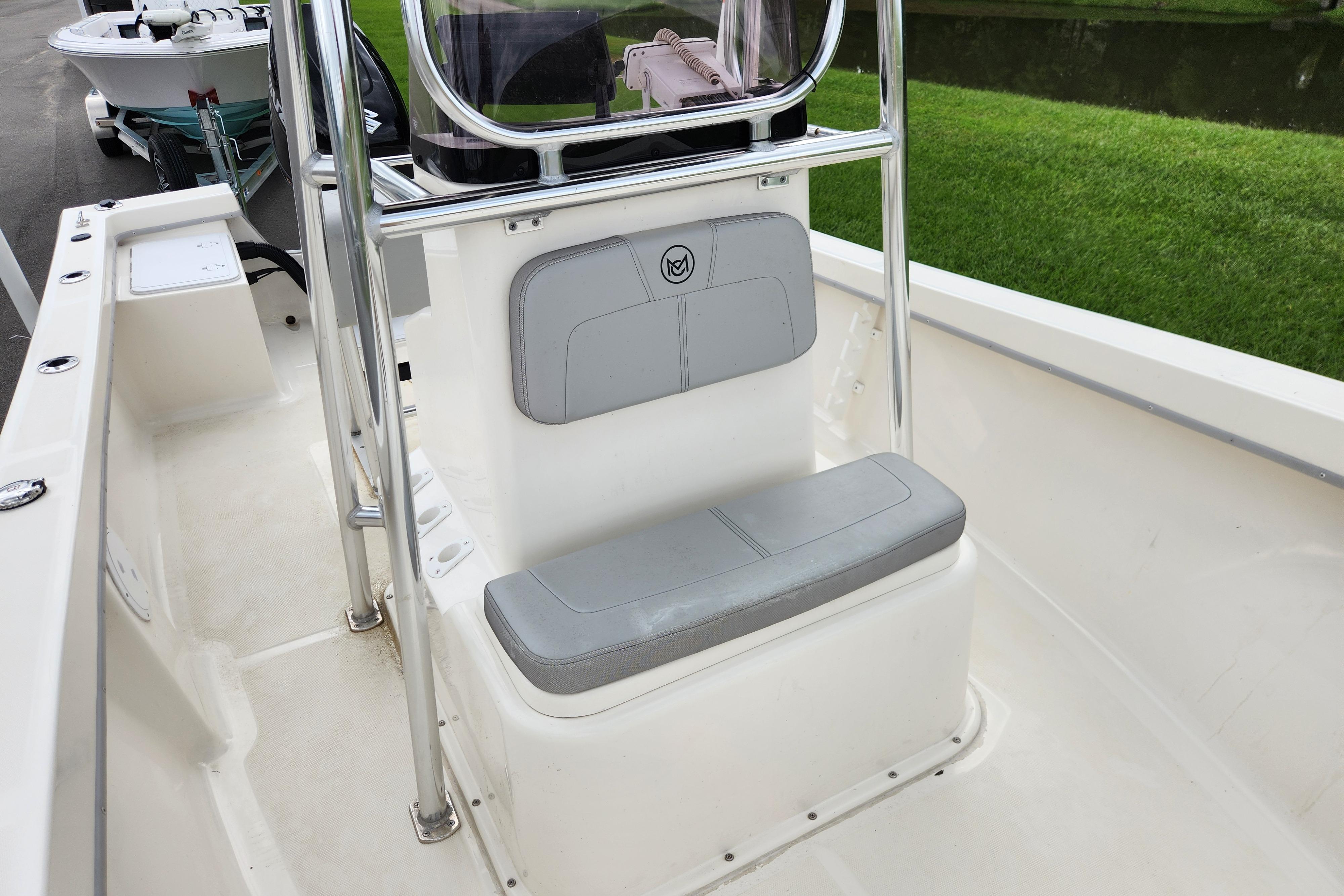 2023 May-Craft 1900CC boat interior with gray seating and stainless steel frame.