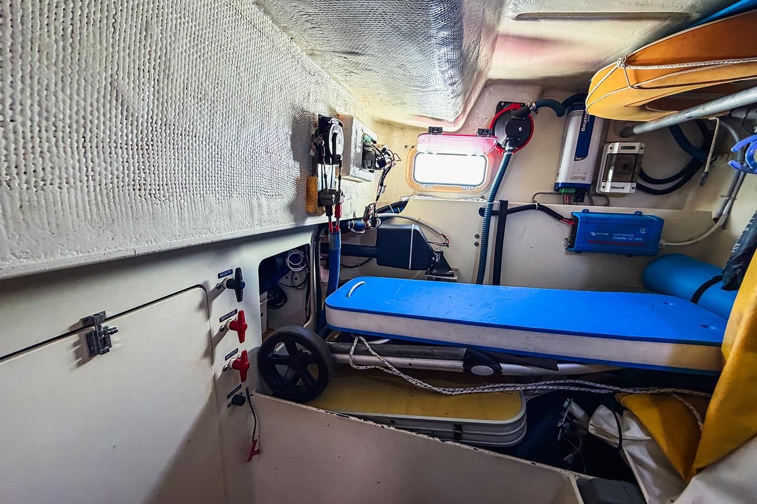 Interior of 2006 RM Yachts 1050, showcasing equipment and storage in a compact space.