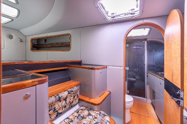 Interior of 2025 Shuttleworth 52 AeroRig yacht, featuring modern design and wood accents.