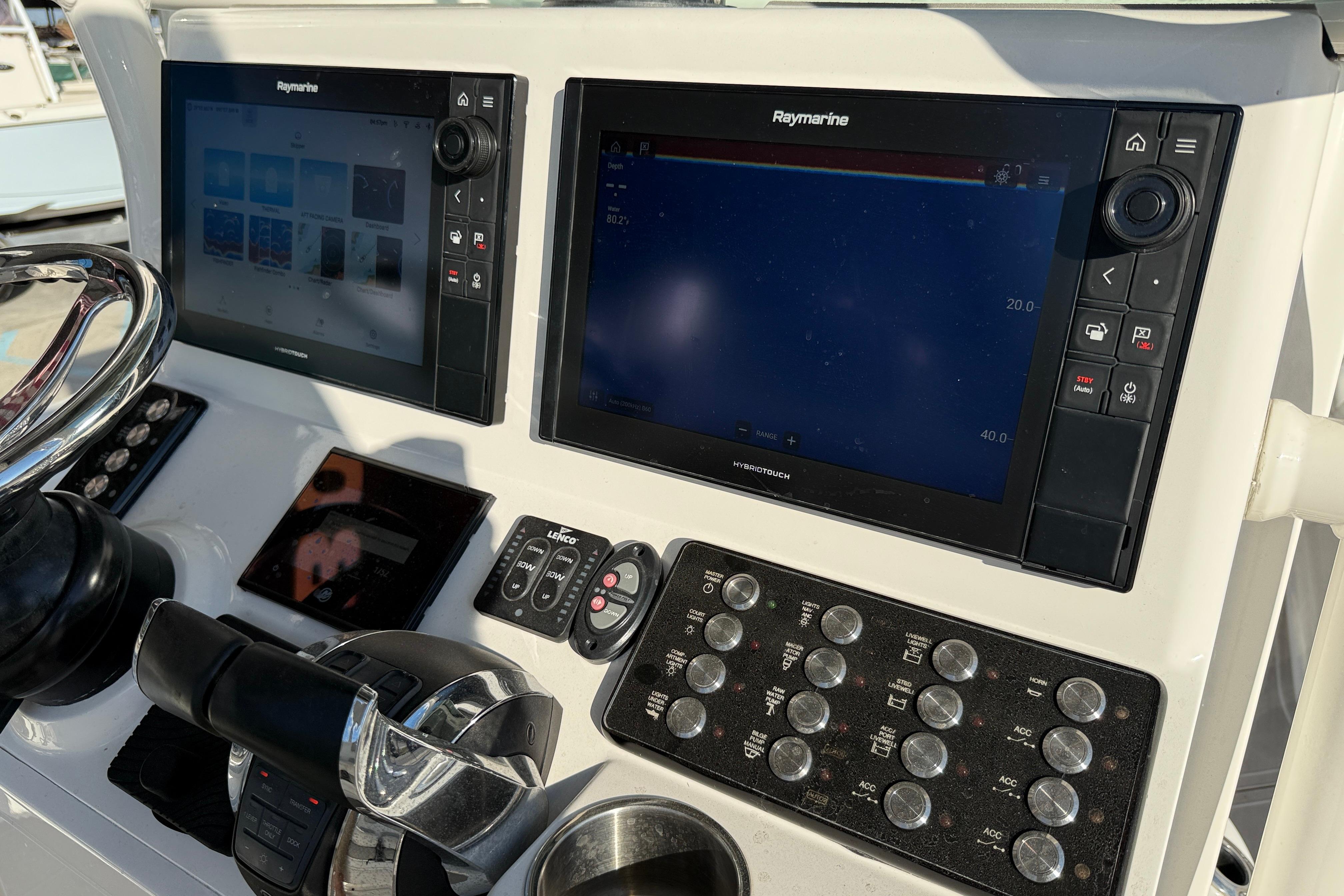 Control panel of 2022 Caymas 28 HB Twin boat with Raymarine displays and controls.