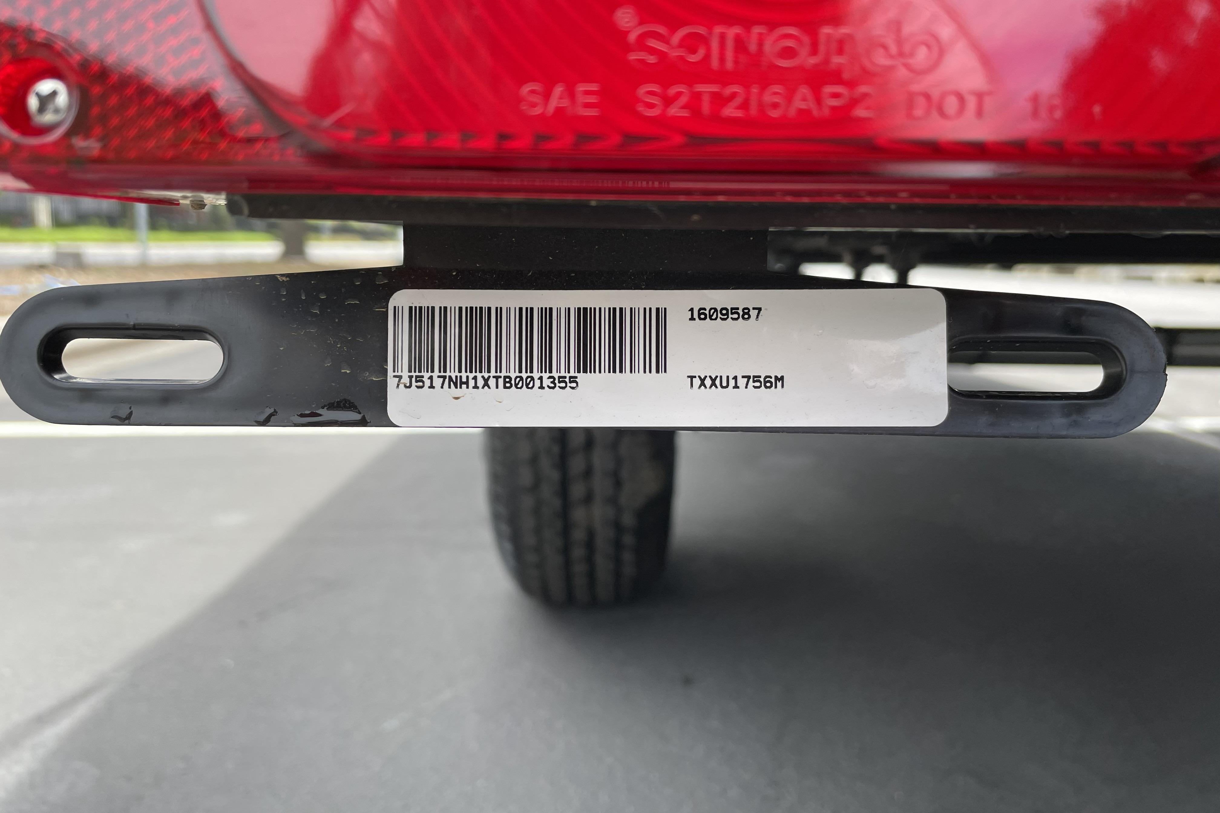 Barcode and serial number on a 2026 Tracker Grizzly 1756 T Marsh boat trailer.