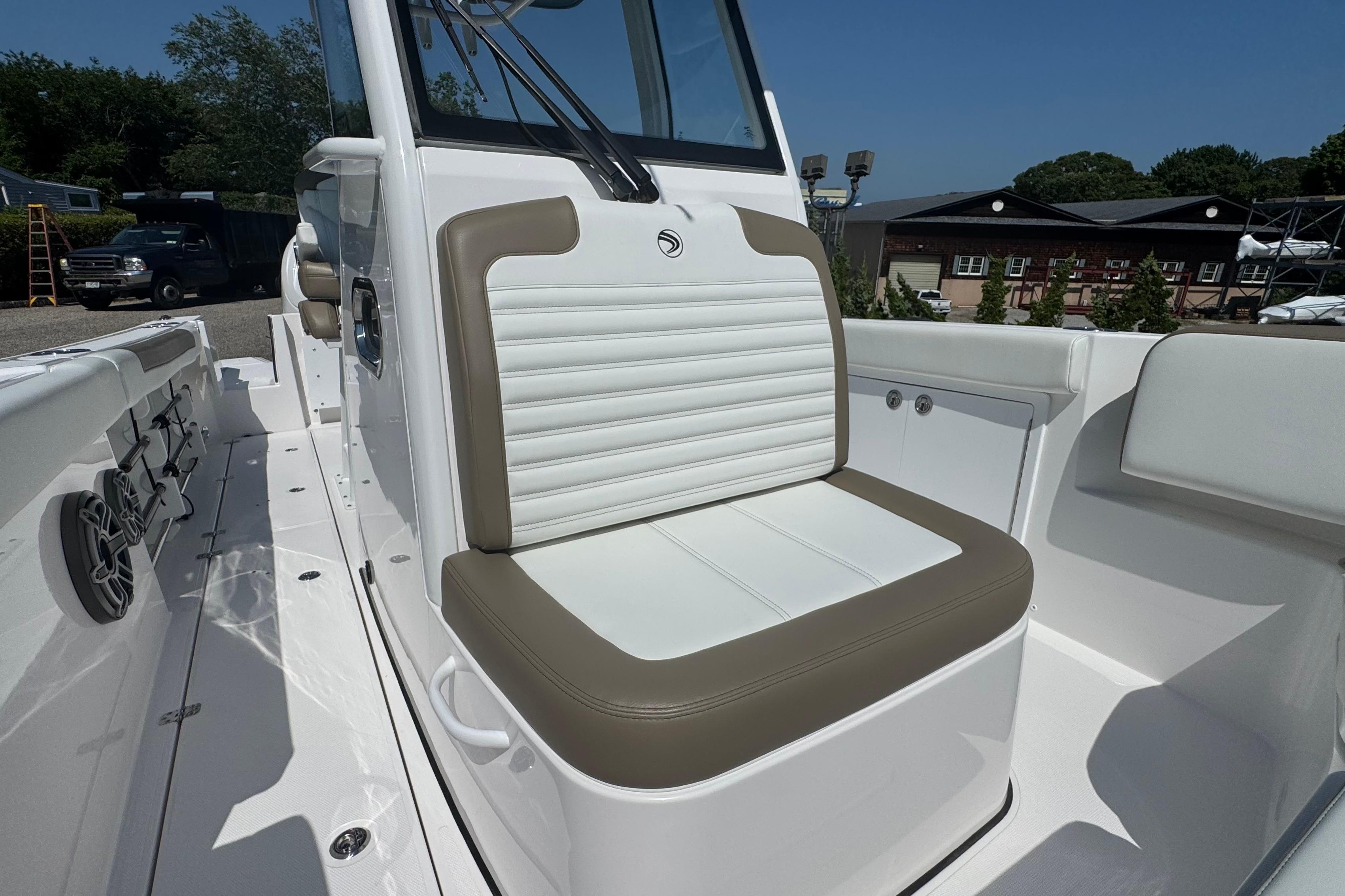 Edgewater 250CC 2026 boat interior with cushioned seating and modern design.