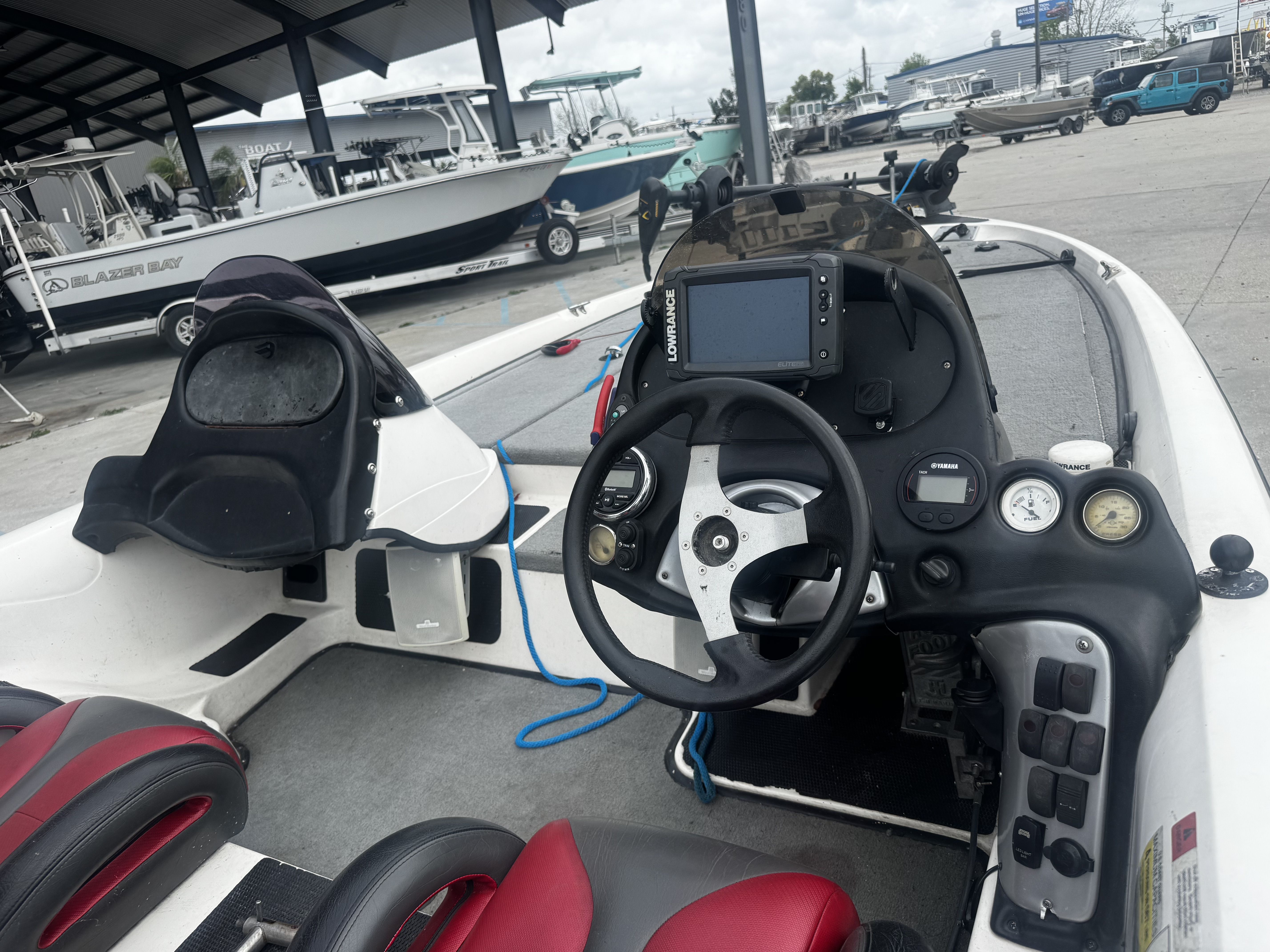 Interior view of a 2006 Stratos 285 Pro XL boat with steering console.