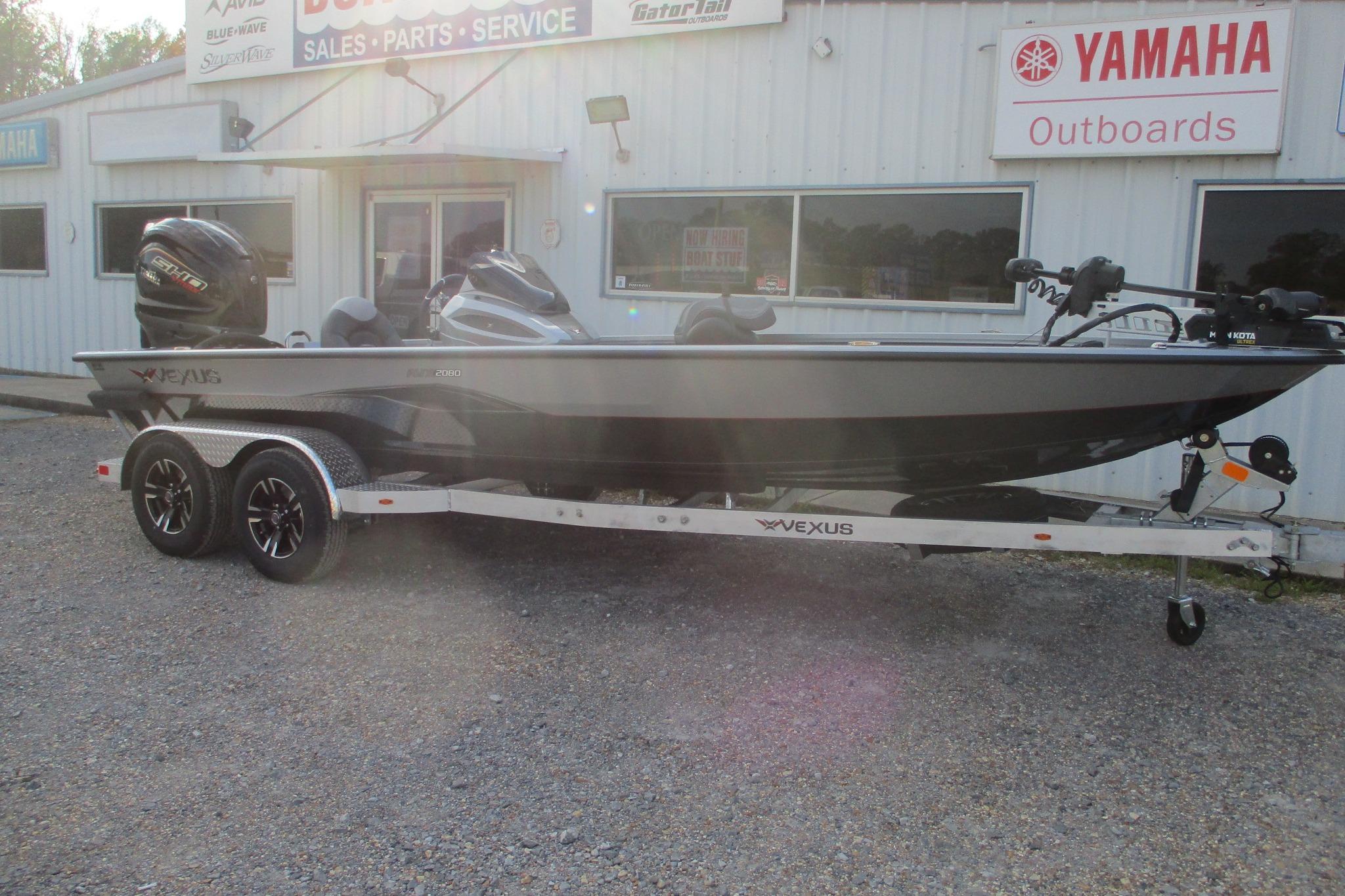 2026 Vexus AVX2080 boat on trailer outside dealership with Yamaha signage.