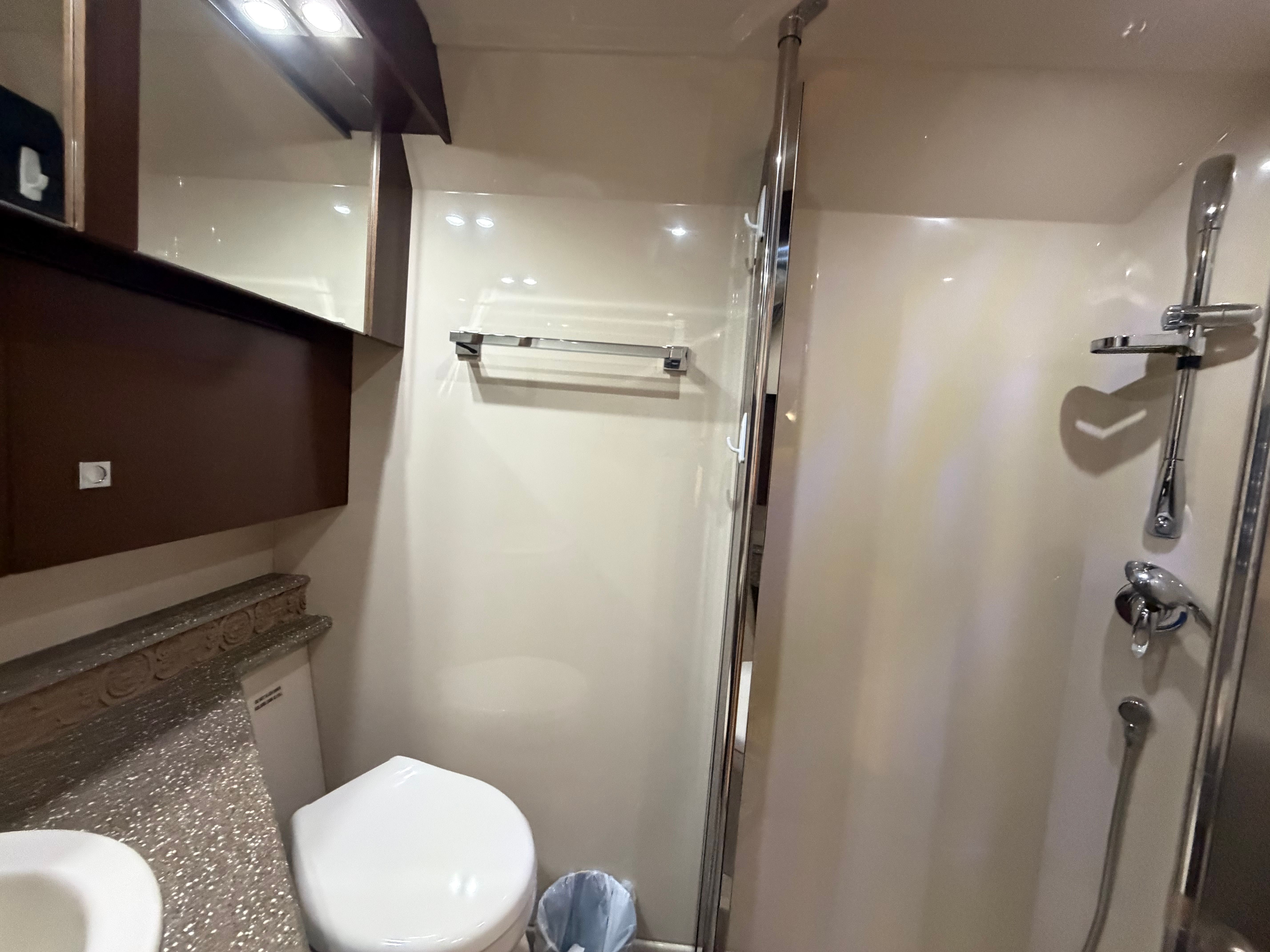 Luxurious bathroom in a 2012 Cruisers Yachts 430 Sports Coupe.