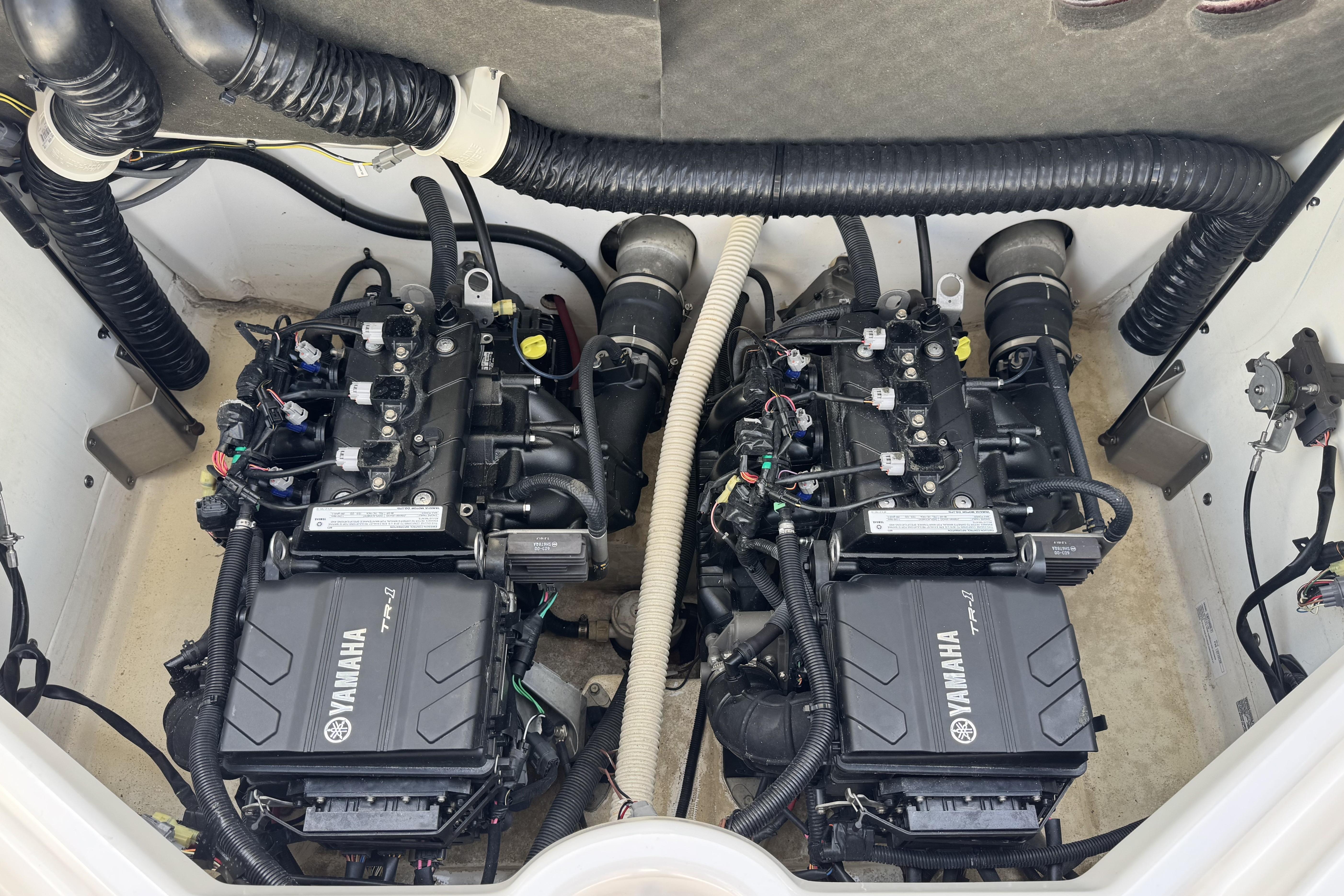 2018 Yamaha AR210 boat engine compartment with dual Yamaha TR-1 engines.