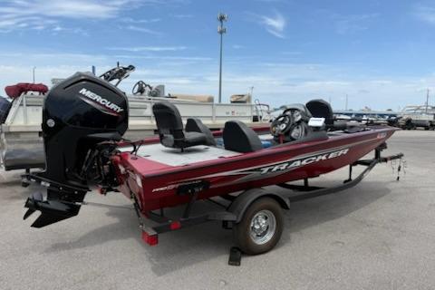 2024 Tracker Pro Team 175 TXW boat with Mercury engine, parked on a trailer.