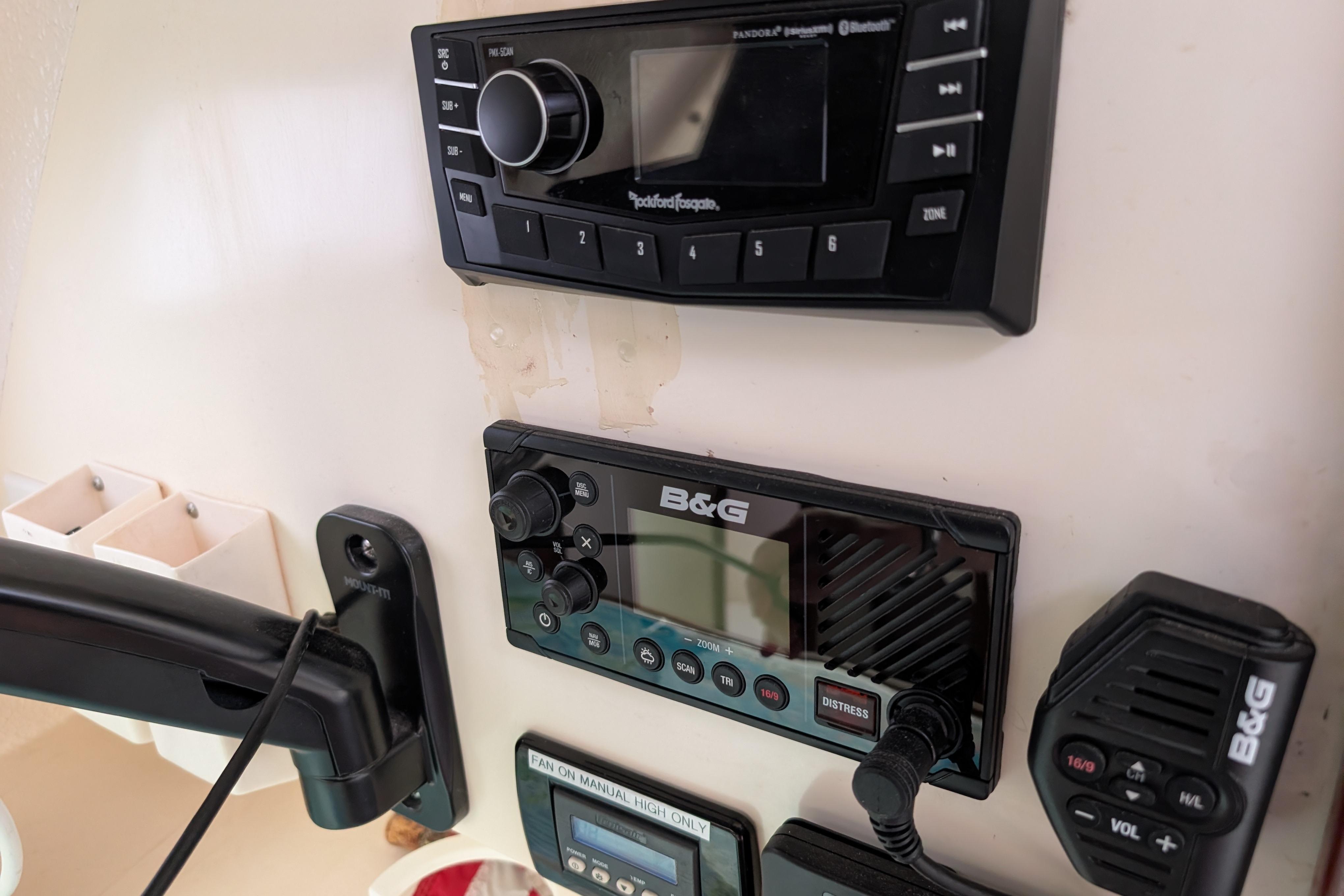 Control panel of a 1999 Island Spirit 37 yacht with navigation and communication equipment.