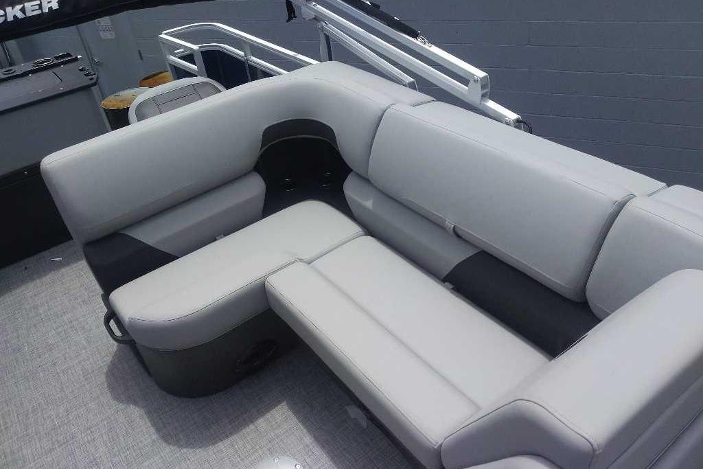Luxurious seating on 2026 Sun Tracker SportFish 20 DLX pontoon boat.