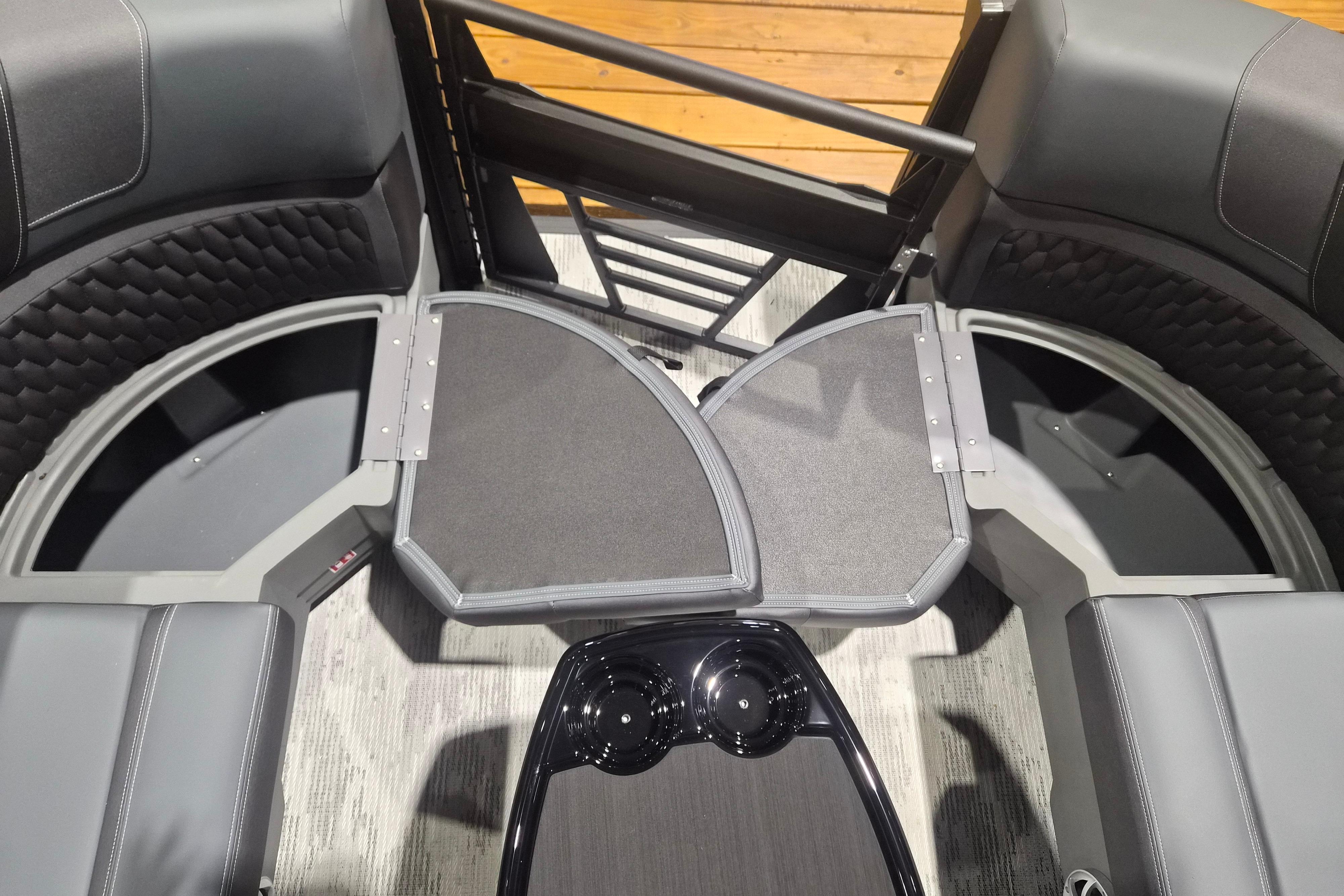 Interior view of 2026 Sylvan L3 ULZ boat with seating and storage compartments.