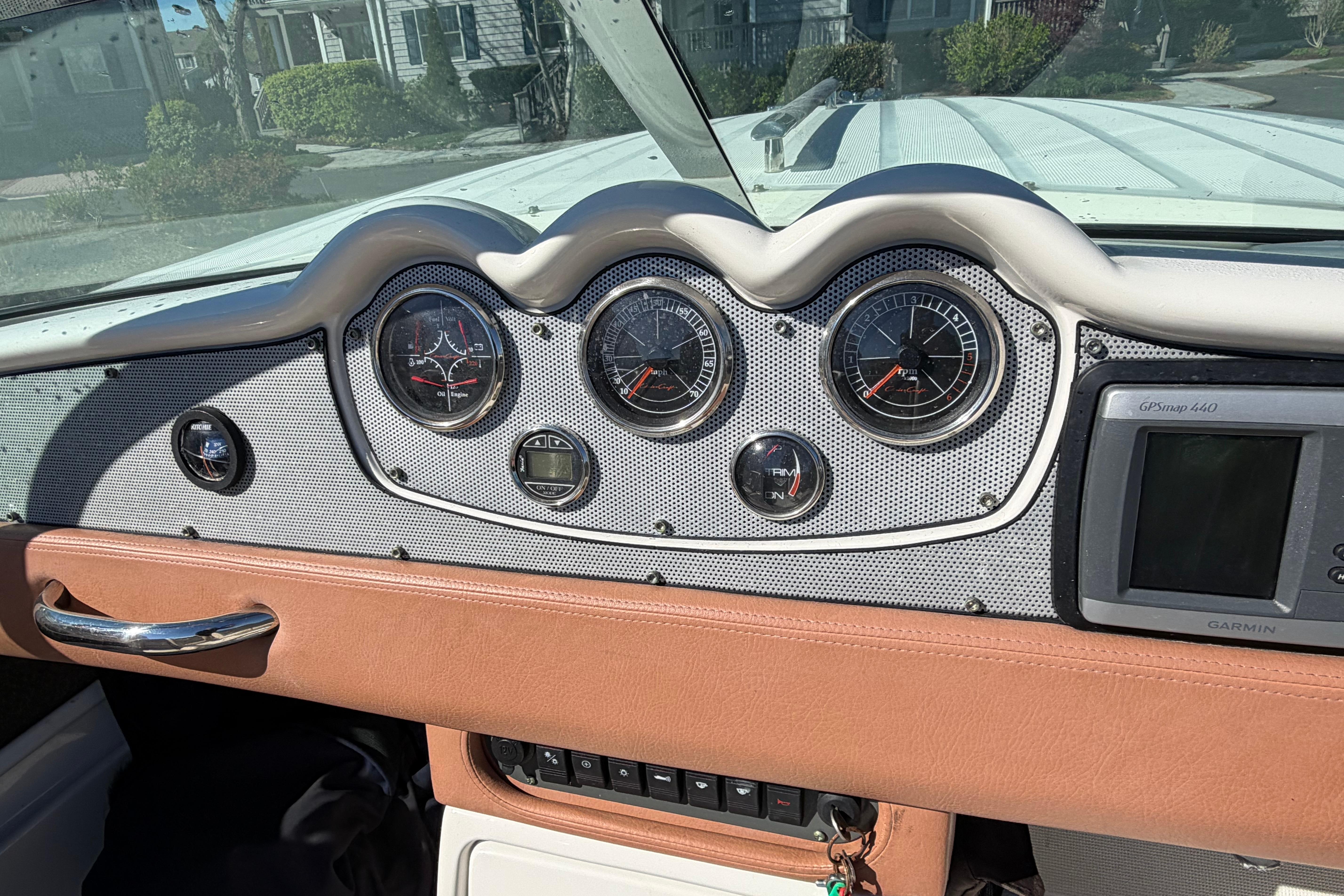 2006 Chris-Craft Speedster dashboard with gauges and Garmin GPS system.