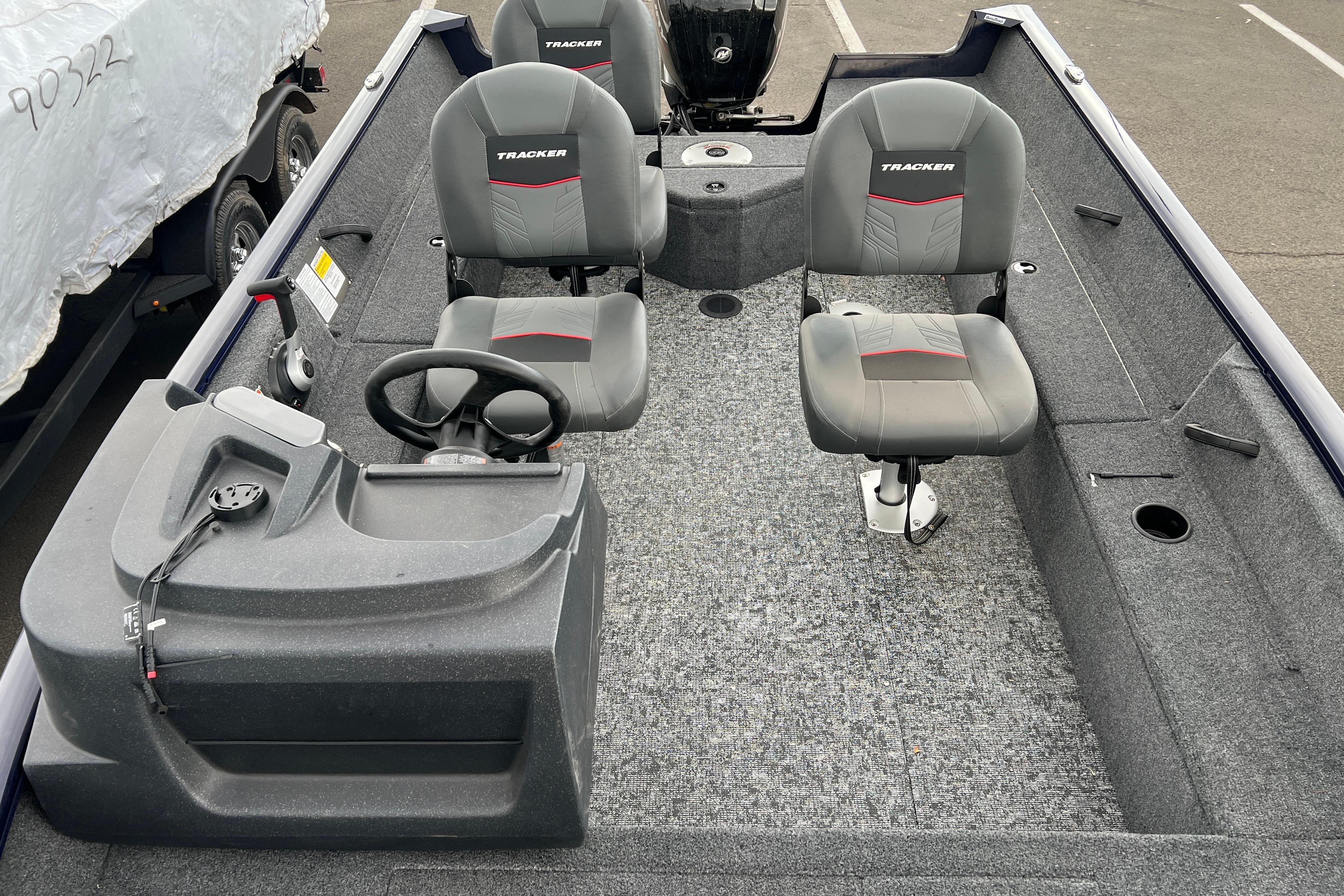 2026 Tracker Pro Guide V-16 SC boat interior with dual seats and steering console.
