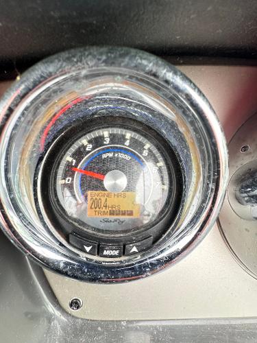 Close-up of 2015 Sea Ray 260 Sundancer engine hour meter showing 200.4 hours.