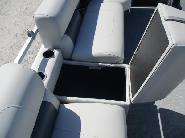 Starcraft LX16R 2025 boat seating with storage compartment and cup holders.