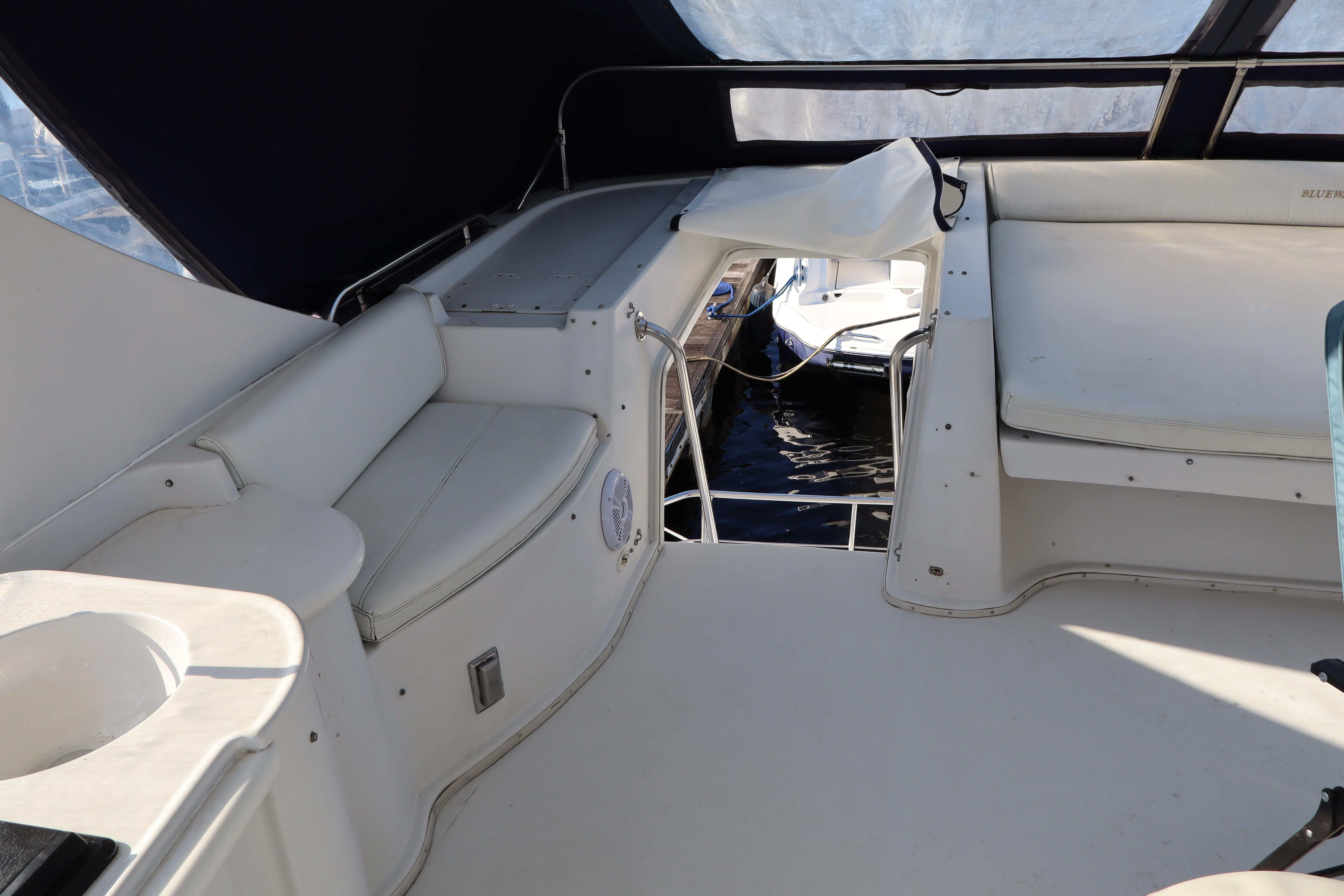 Interior view of 2006 Bluewater Yachts 5200, featuring seating and open deck area.
