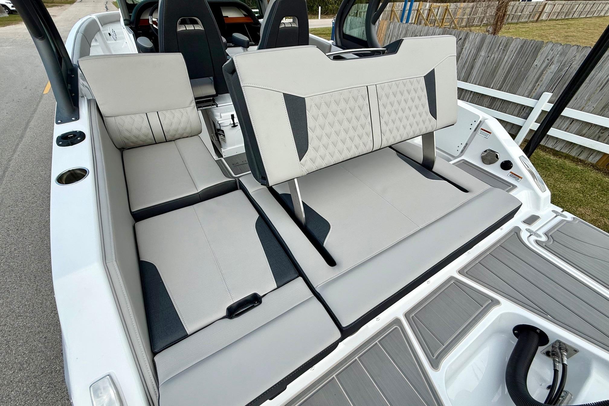 2026 Monterey Elite 25 OB boat interior with stylish seating and modern design.