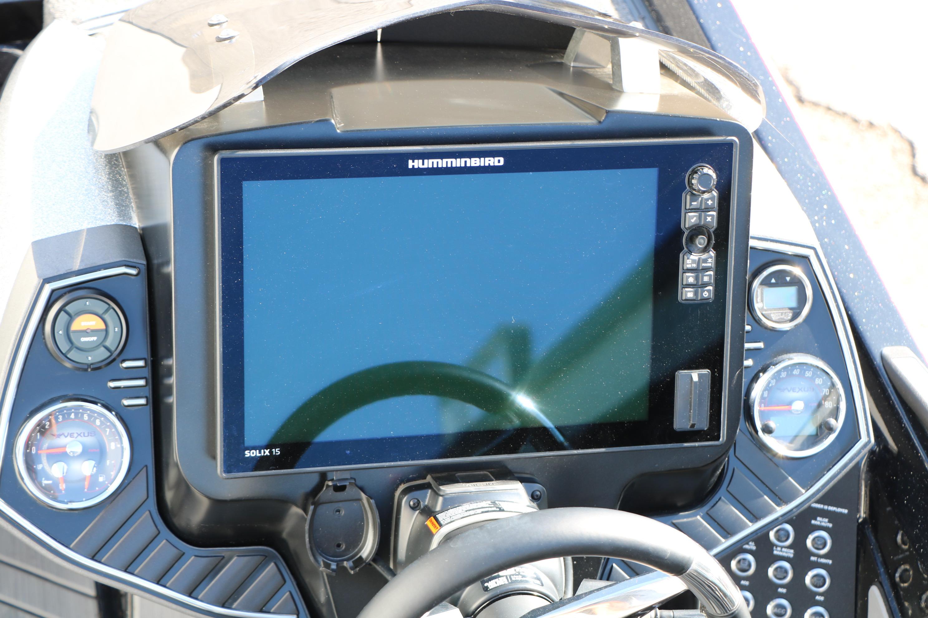 2022 Vexus VX21 boat dashboard with Humminbird Solix 15 display and gauges.