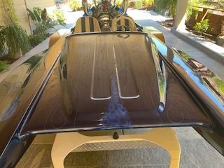 A 1980 Sanger HYDRO V DRIVE with a sleek deck and distinctive design.